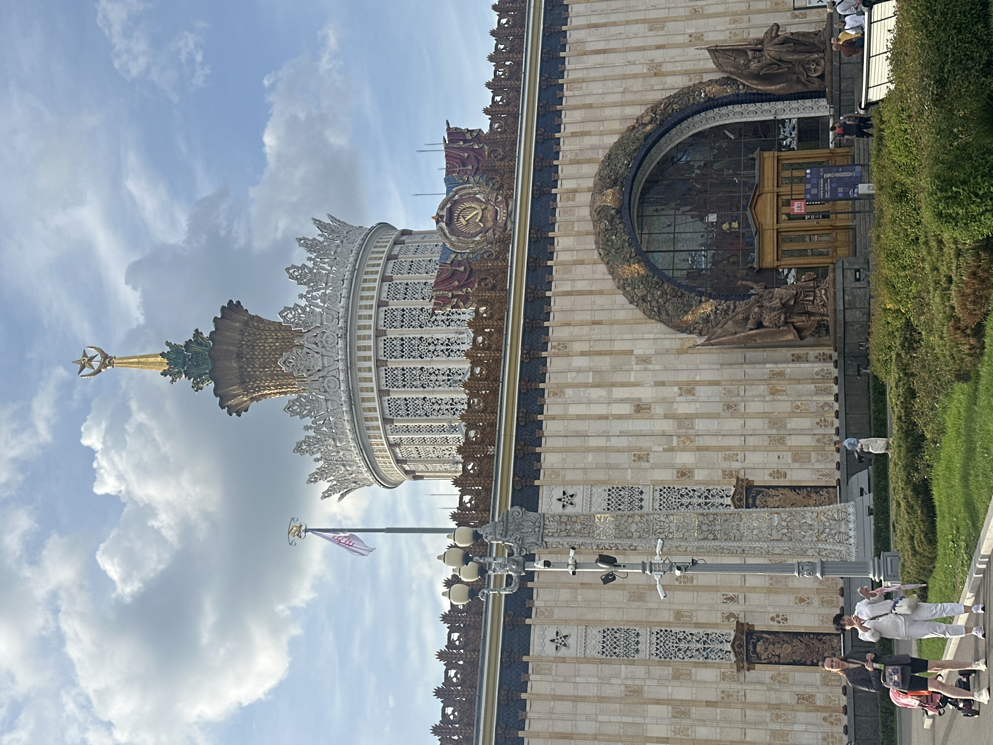 Visitor documents VDNKh landmarks and wildlife in Moscow afternoon