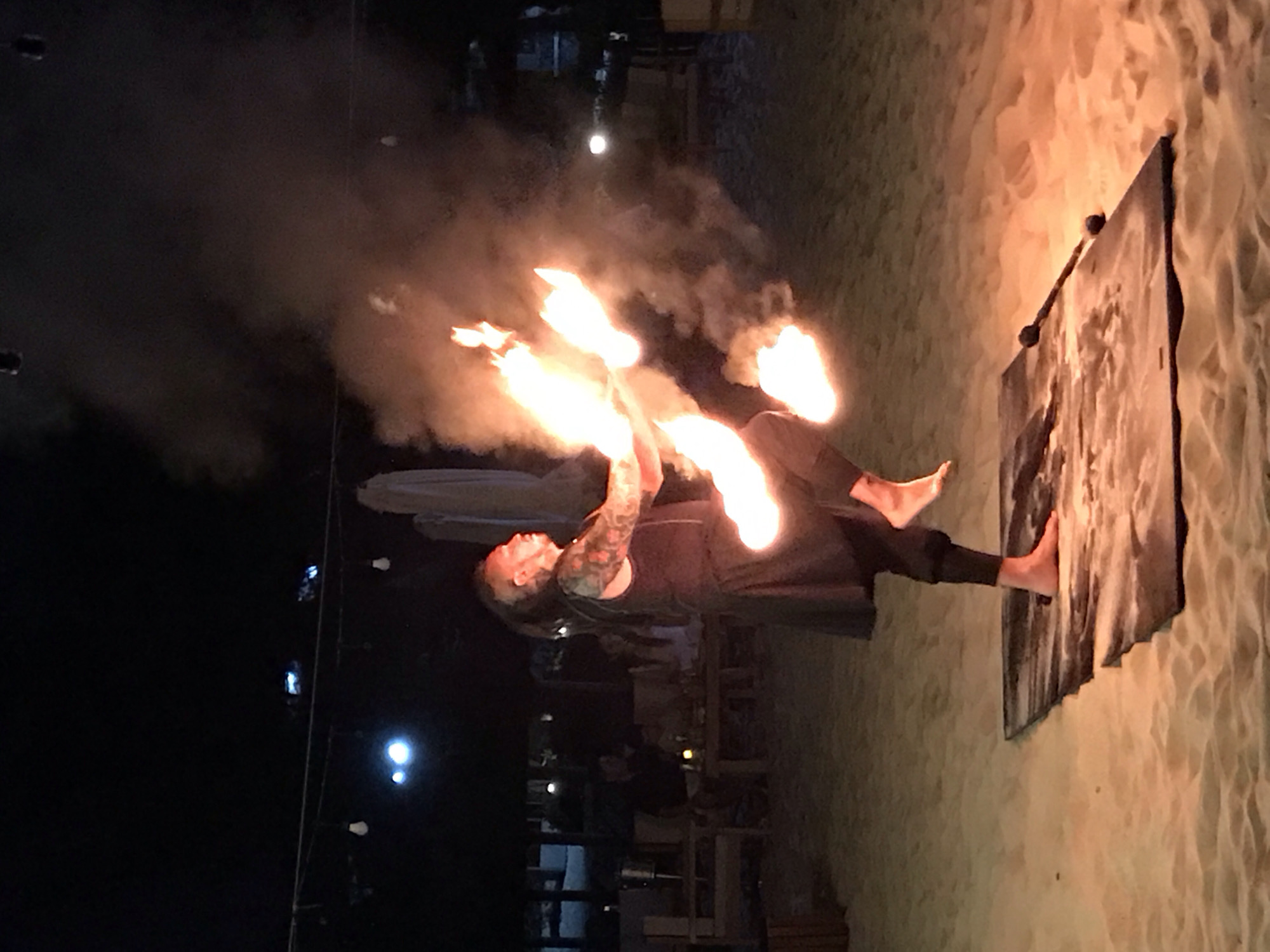 Fire performers take the beach at a Vietnam beachfront bar night