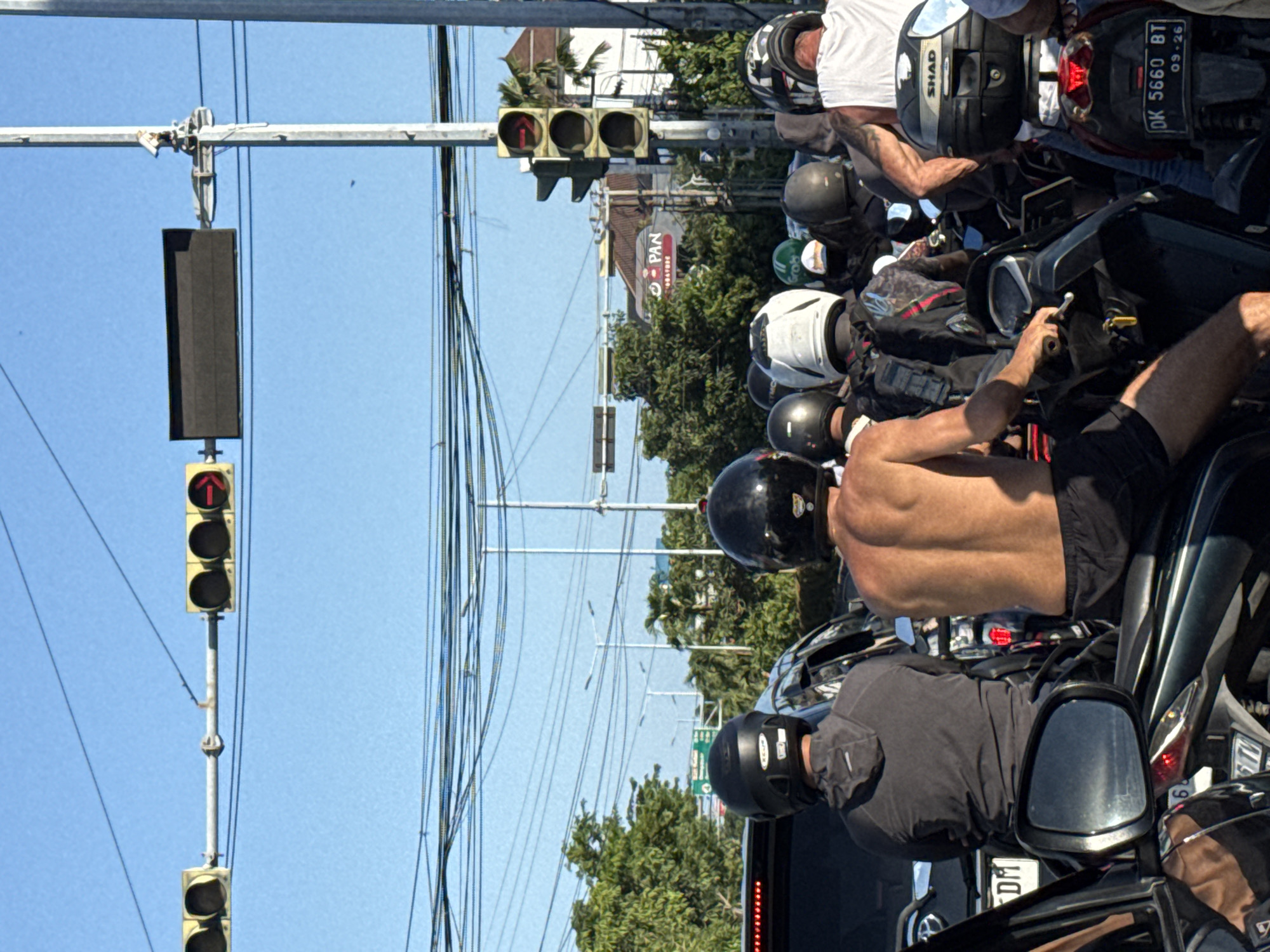 Motorcyclists stop at red light in Denpasar traffic