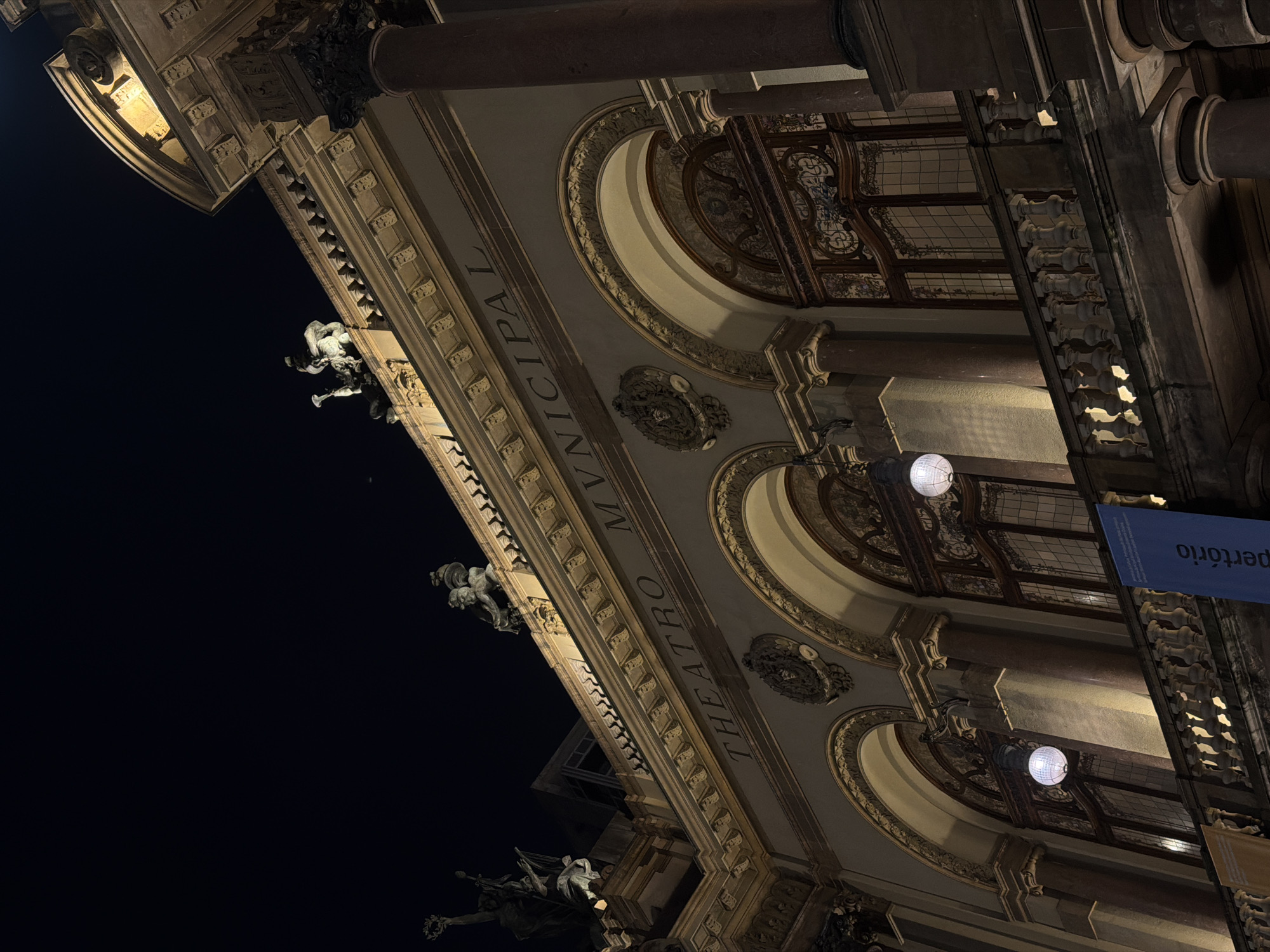 São Paulo's Theatro Municipal at night, with a giant inflatable dog