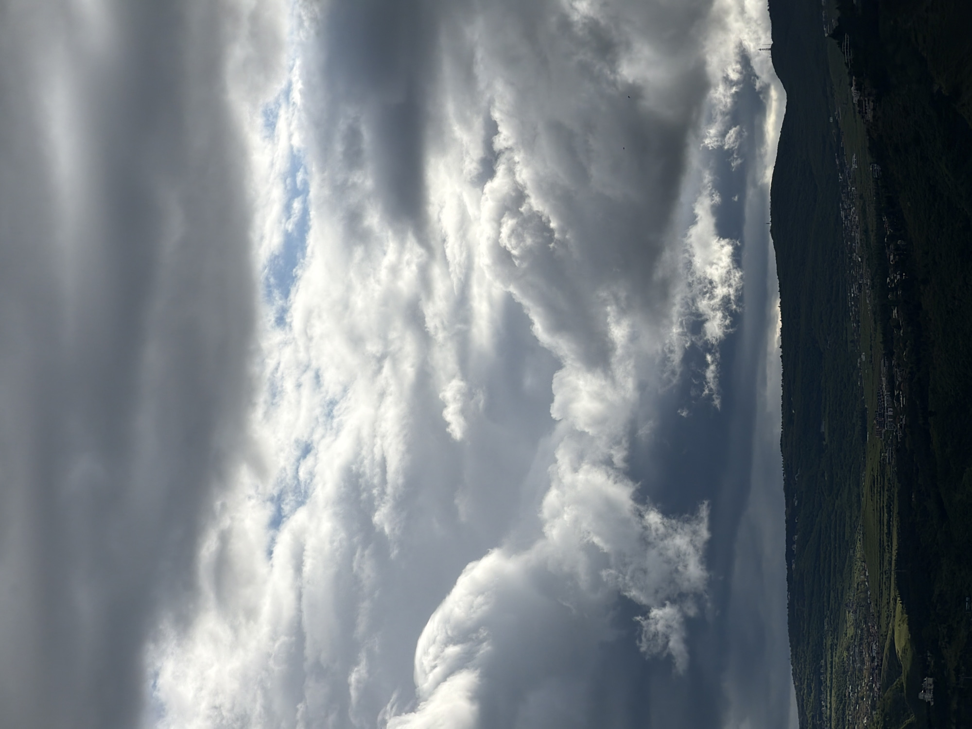 Mountain view with mixed clouds observed in Tbilisi
