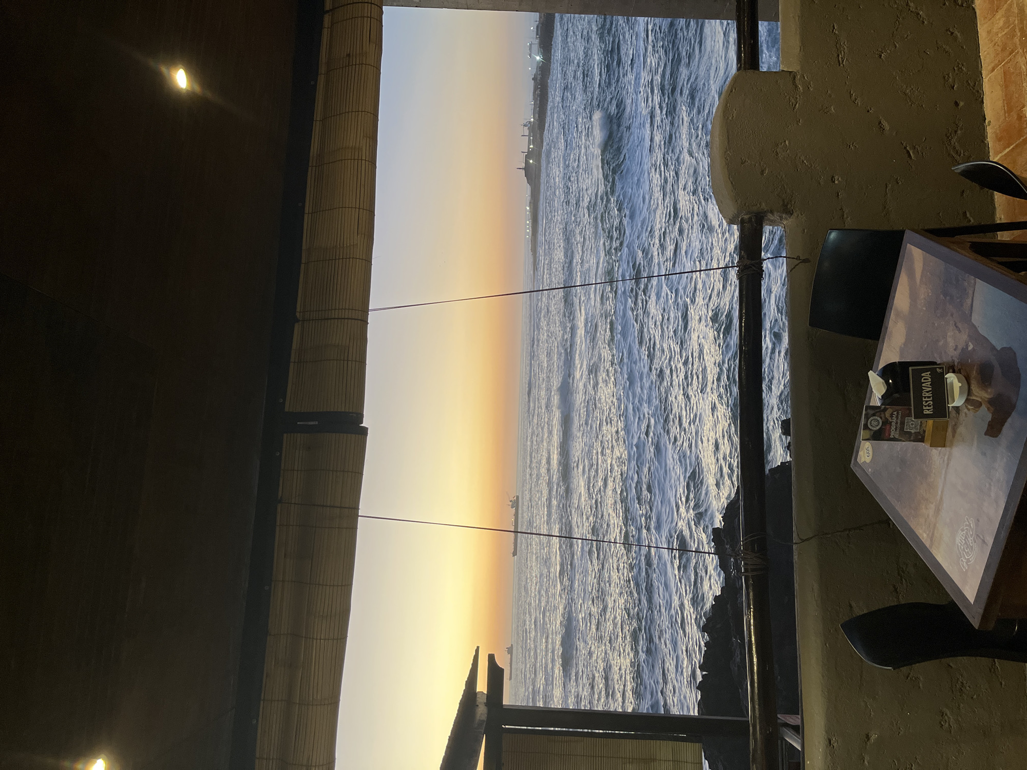 Sunset observed from seaside establishment in Arica, Chile