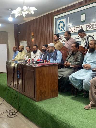 Press conference held at Quetta Press Club with traditional-attired participants