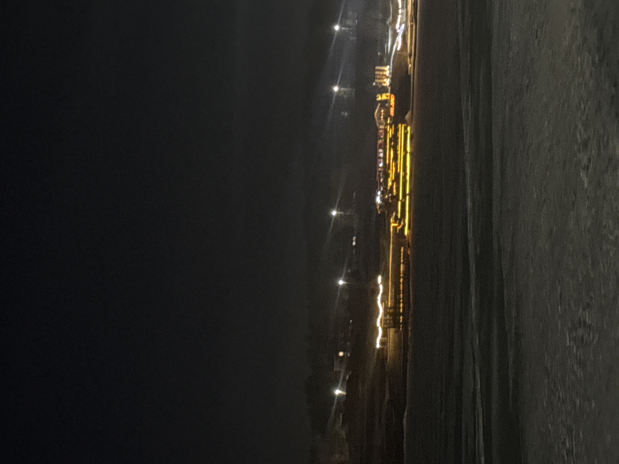Illuminated pier glows with yellow lights in Votkinsk Russia