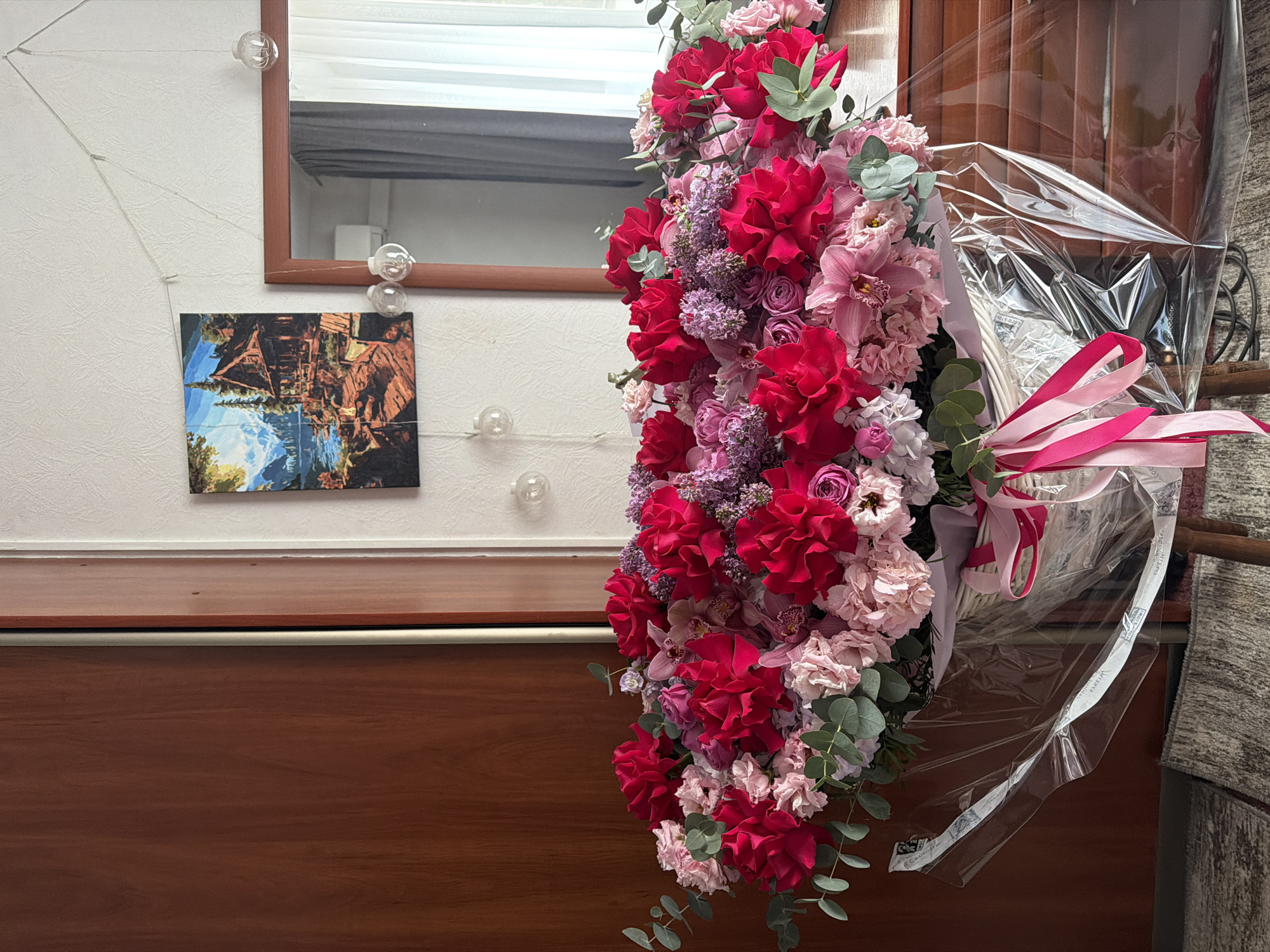 Large floral arrangement observed in Moscow indoor setting