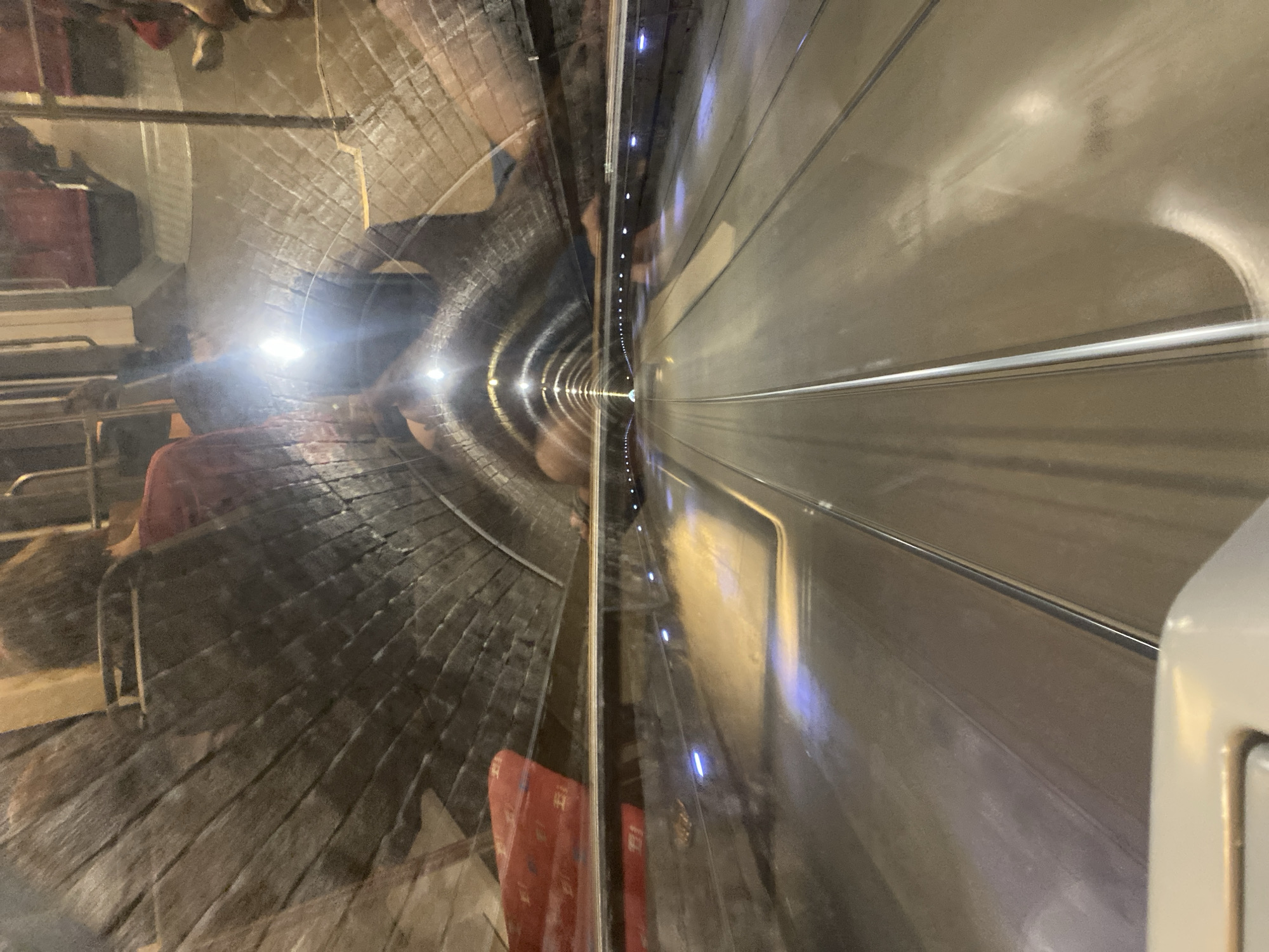 Bratislava tram emerging from a brick tunnel