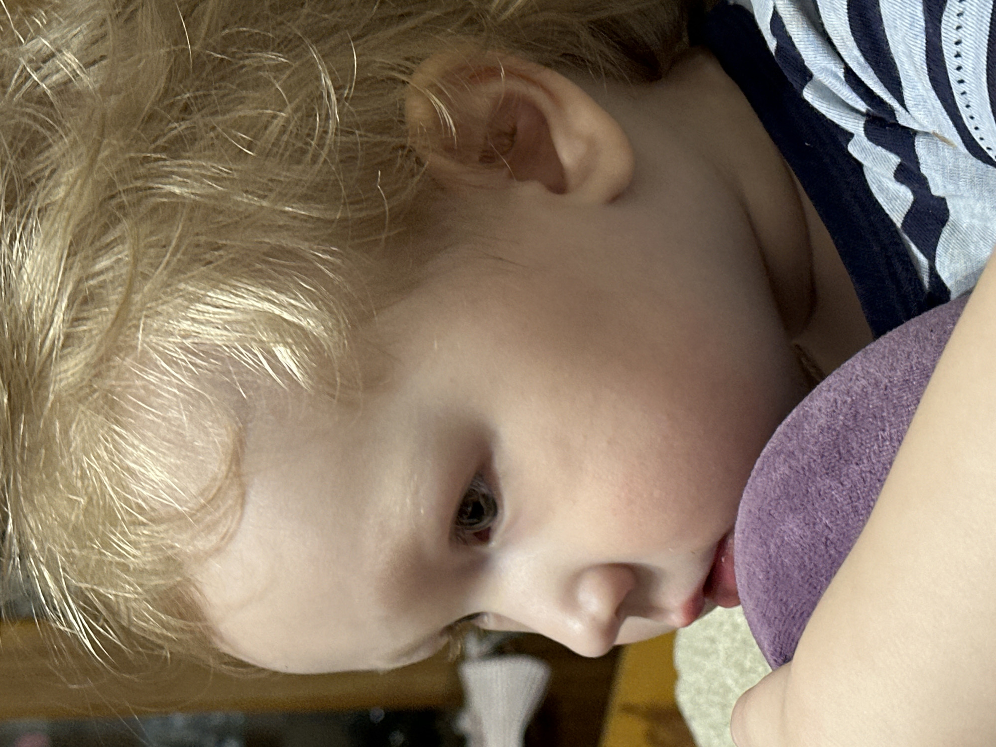 Mother and child share playful moments in Votkinsk home