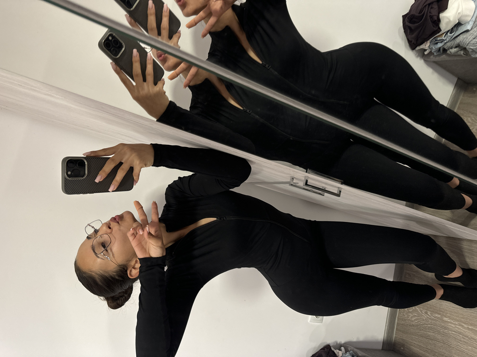 Woman Takes Mirror Selfies in Black Jumpsuit, Dupnitsa