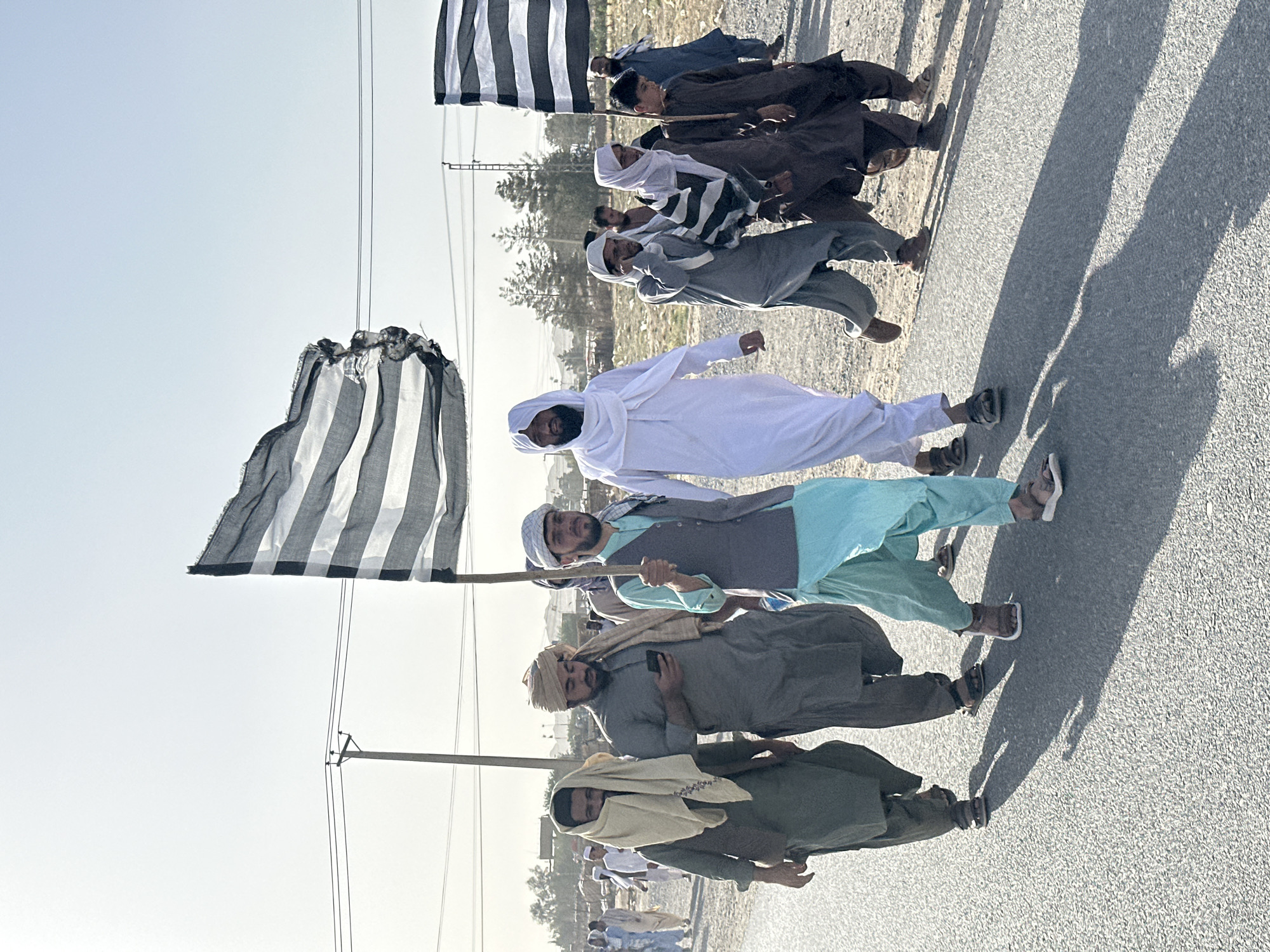 Men's procession marches through Pishin, Pakistan streets