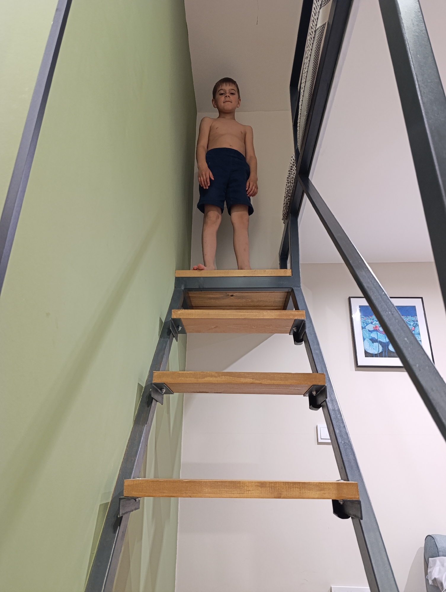 Moscow family captures playful moments with children on stairs