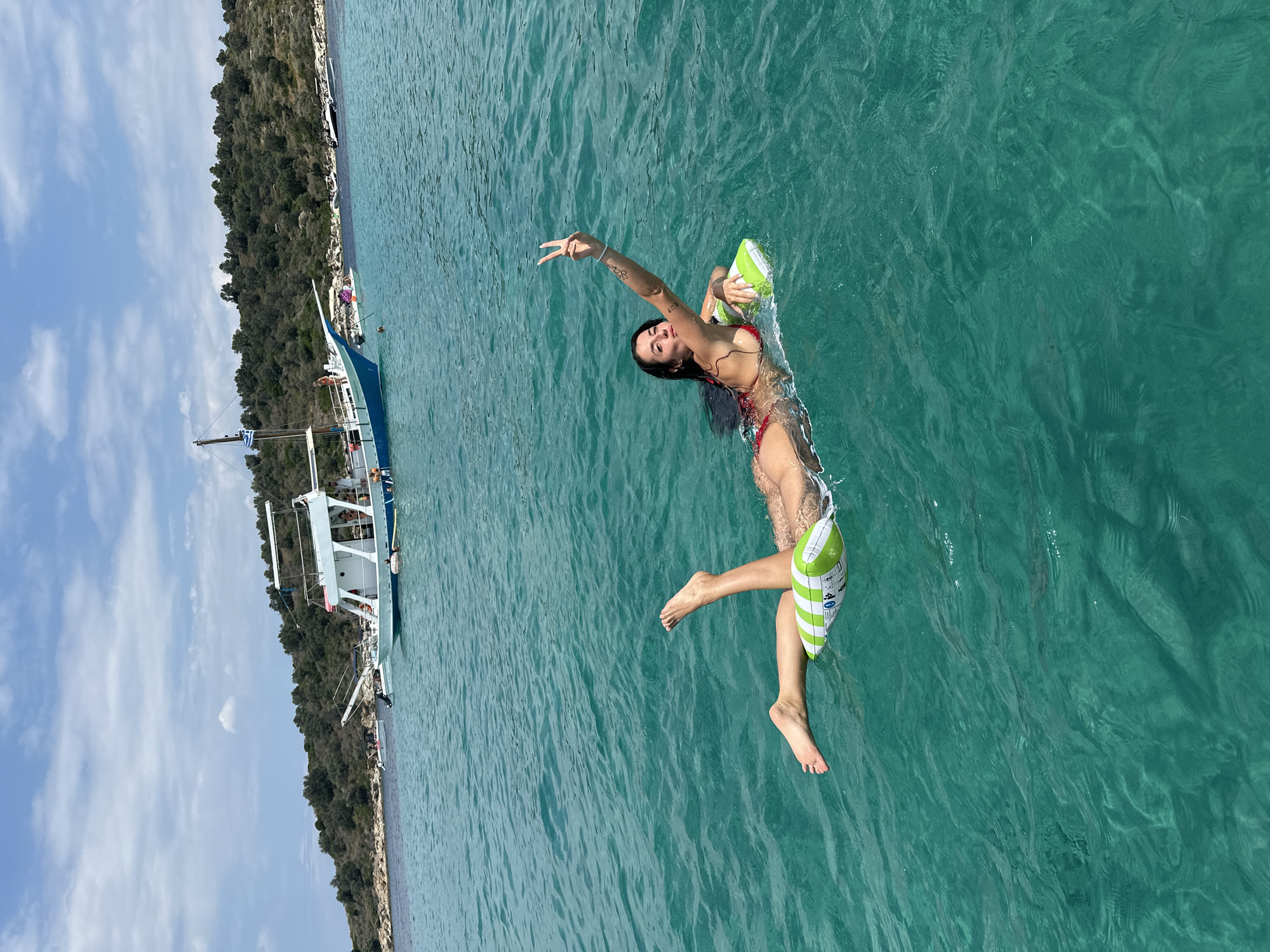 Lazy afternoon float on turquoise Greek waters
