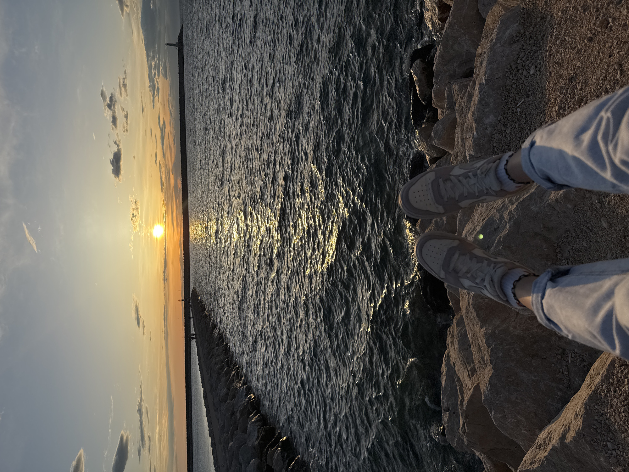 Sunset documented at Bar Montenegro waterfront with anchor monument