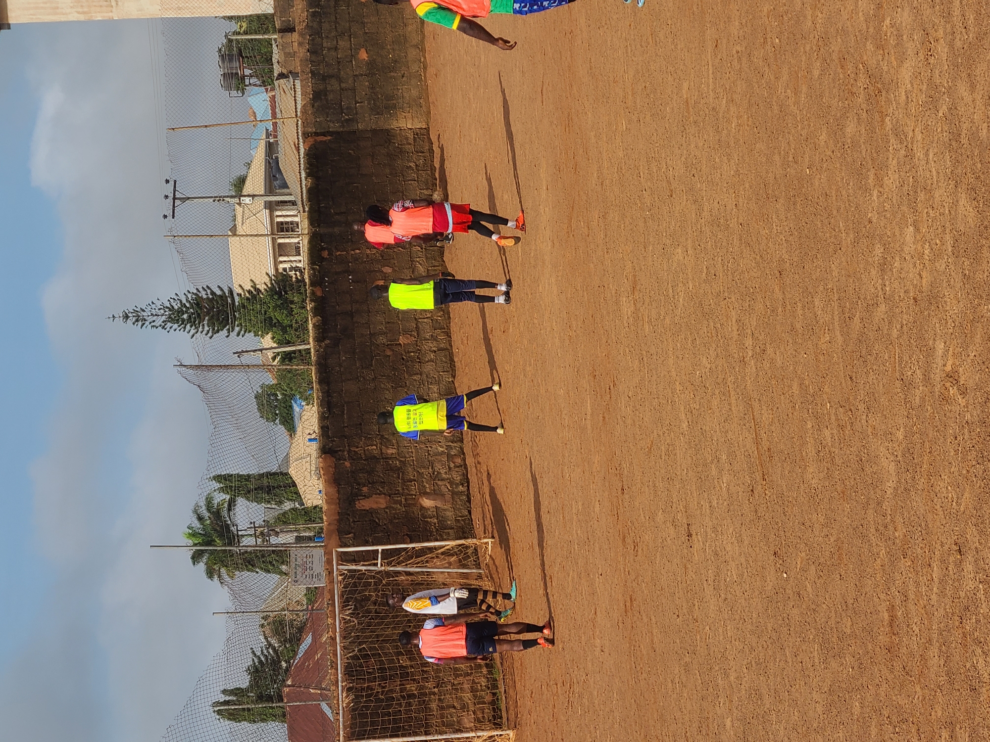 Football training session on a dirt pitch in Barakin Lerawi, Nigeria