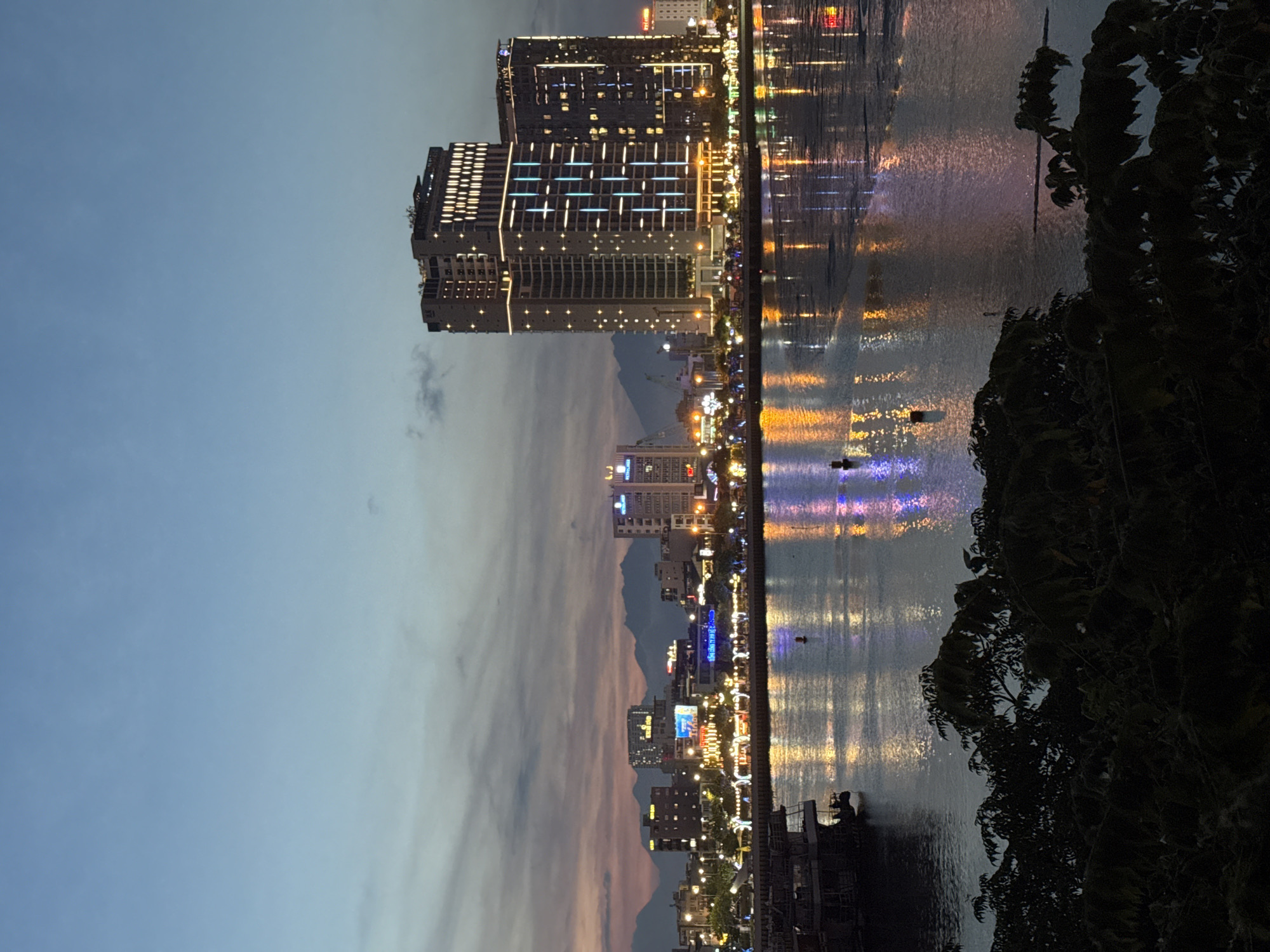 Da Nang's Han River waterfront at sunset and nightfall