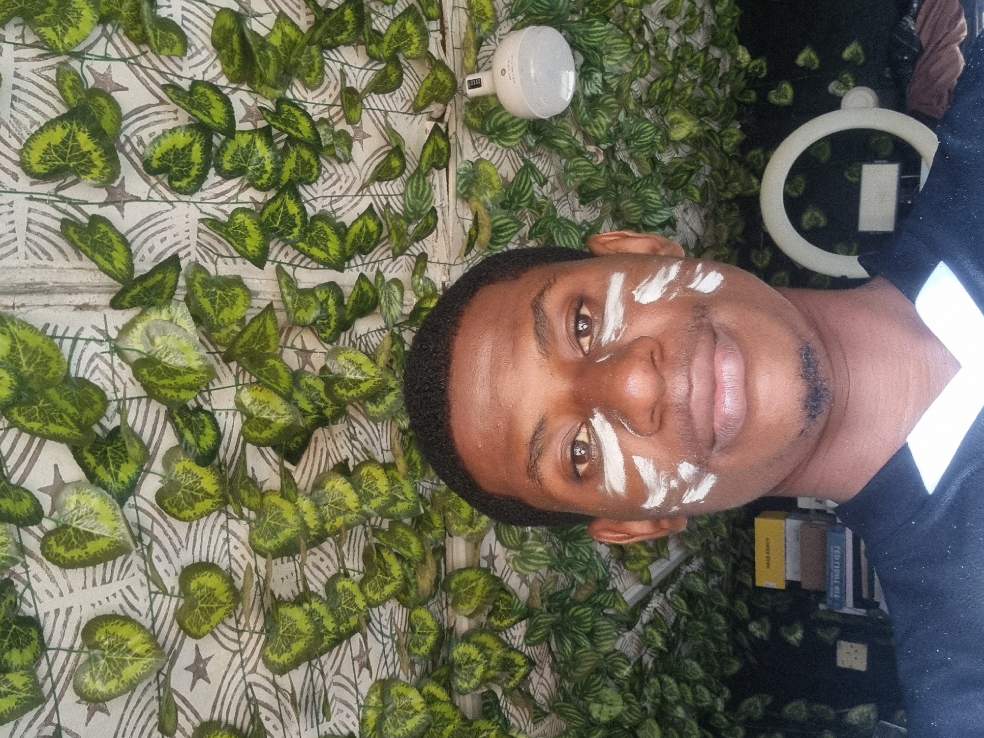 Barbershop visit documented in Onitsha, Nigeria