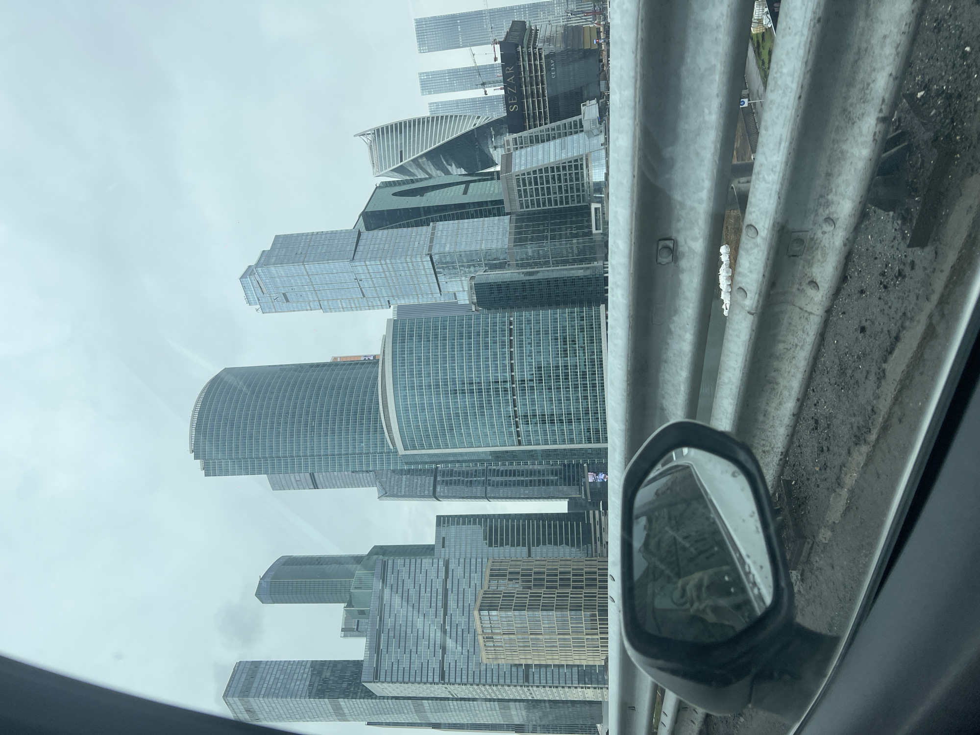 Traveler photographs Moscow City skyscrapers from moving vehicle