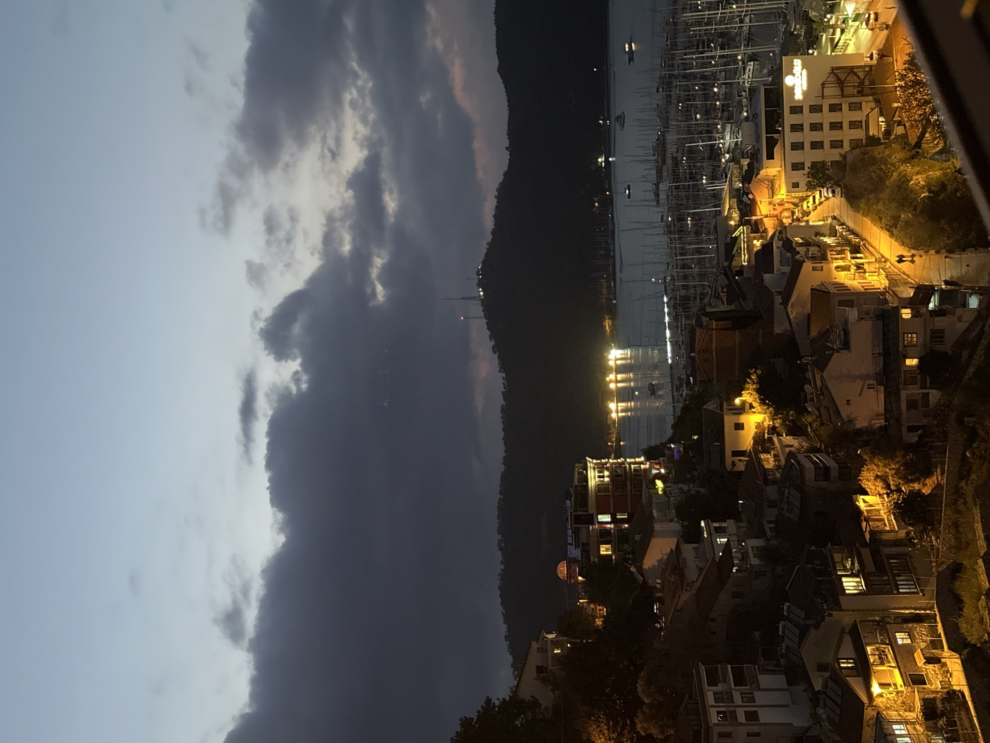 Evening views captured of illuminated Fethiye harbor, Turkey