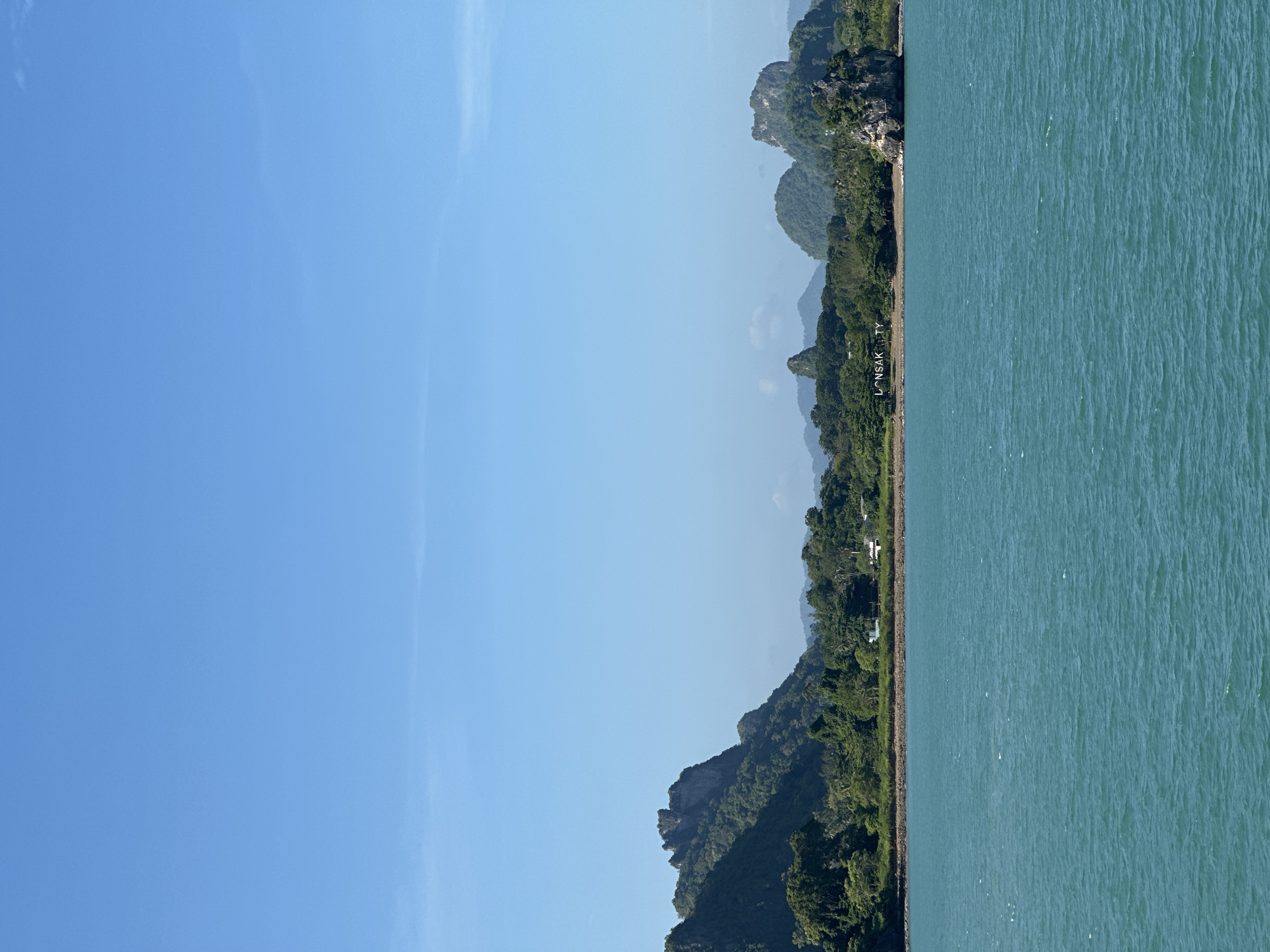 Gulf of Thailand coastline at Don Sak, calm and clear