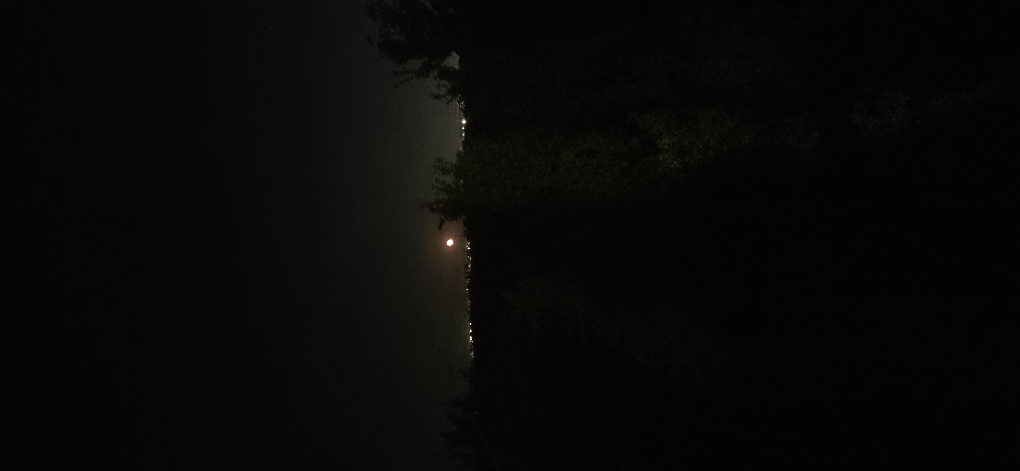 Nighttime water scene captured from shoreline May 5