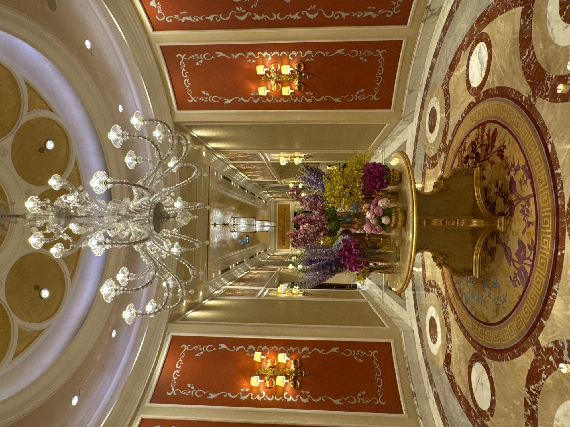 Ornate ceiling fresco documented in luxury Macao interior