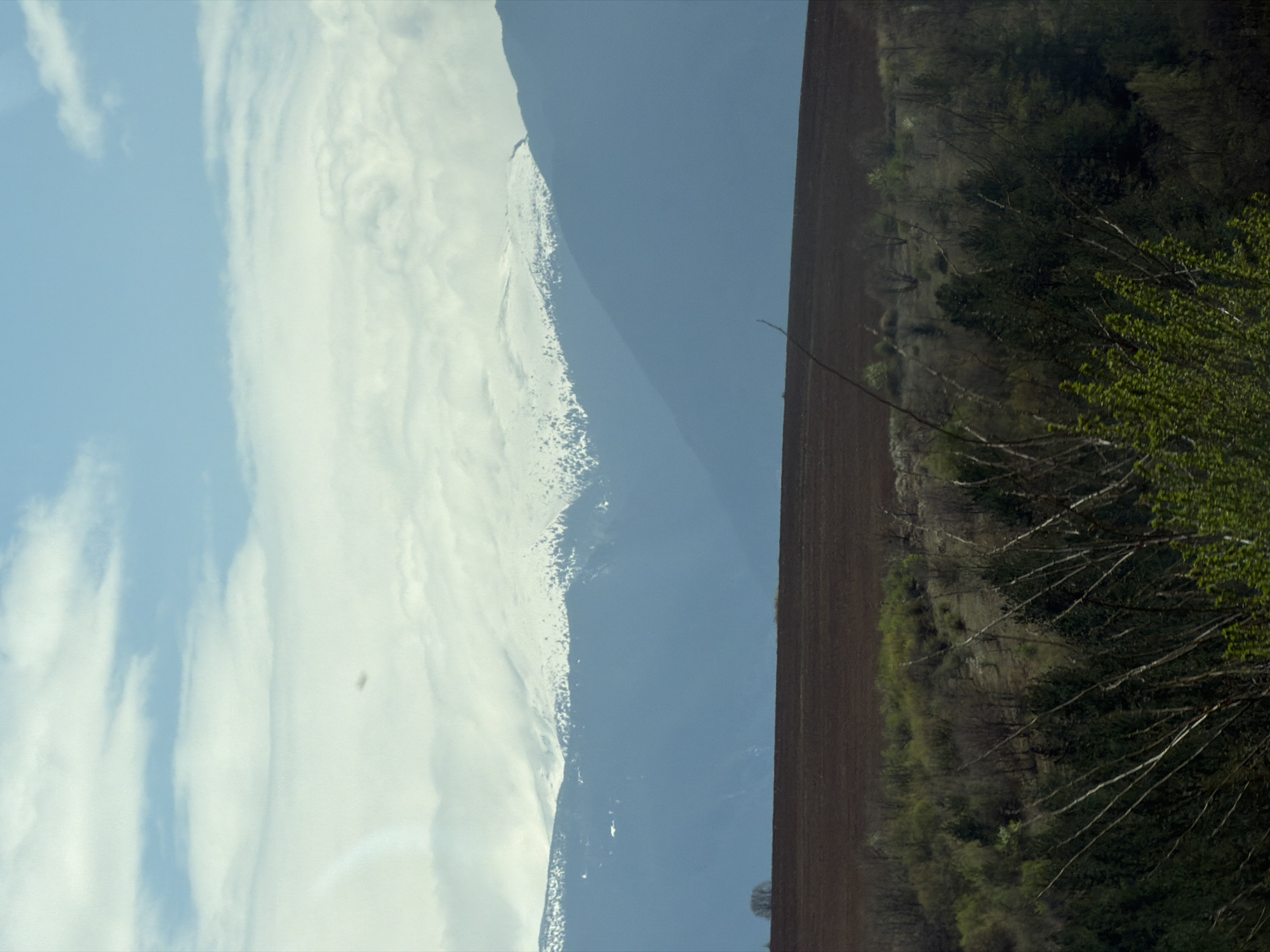 Landscape with cloudy sky and shadows observed in Dyakovo