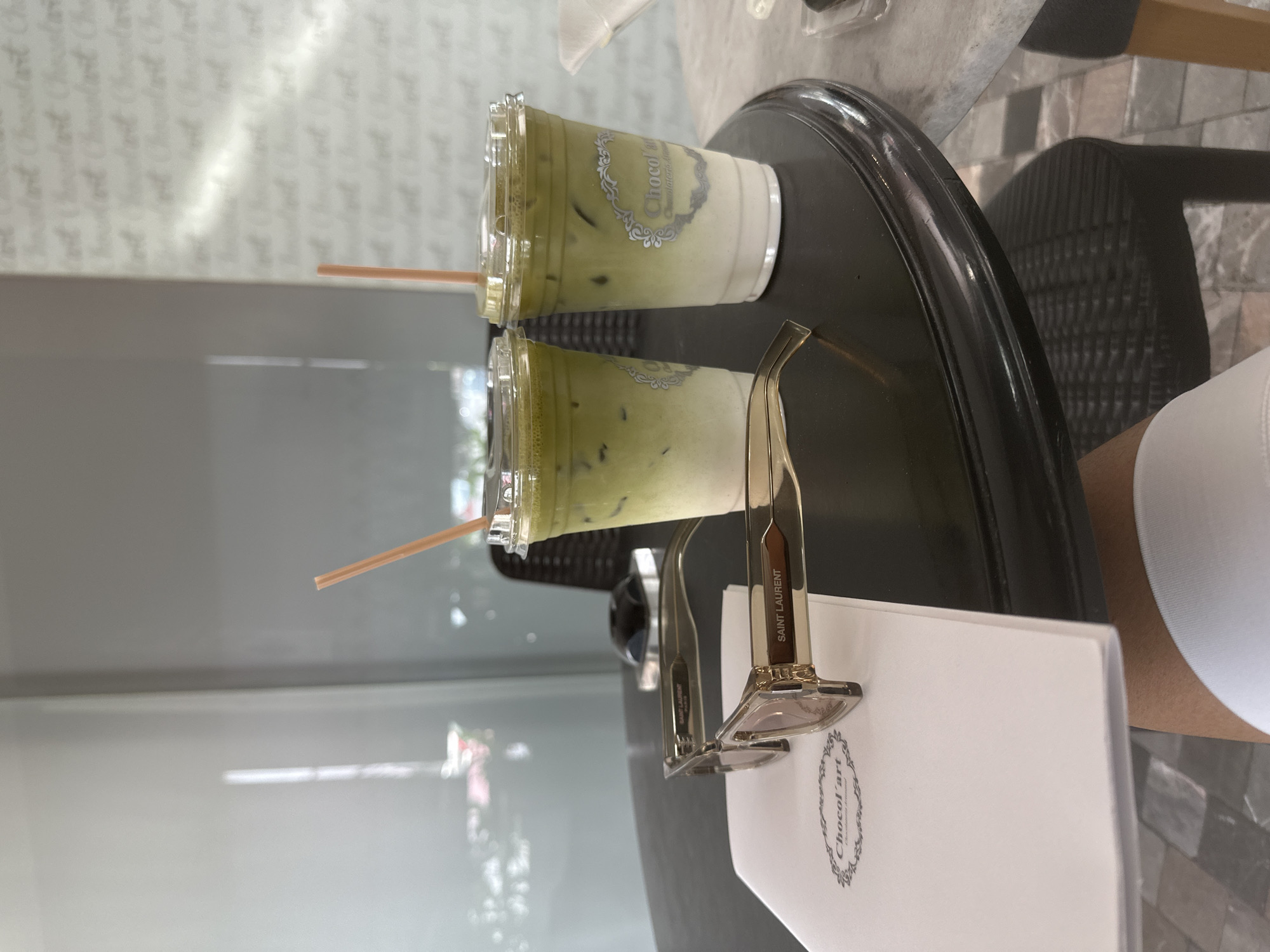 Customer enjoys matcha lattes at Puebla chocolate cafe