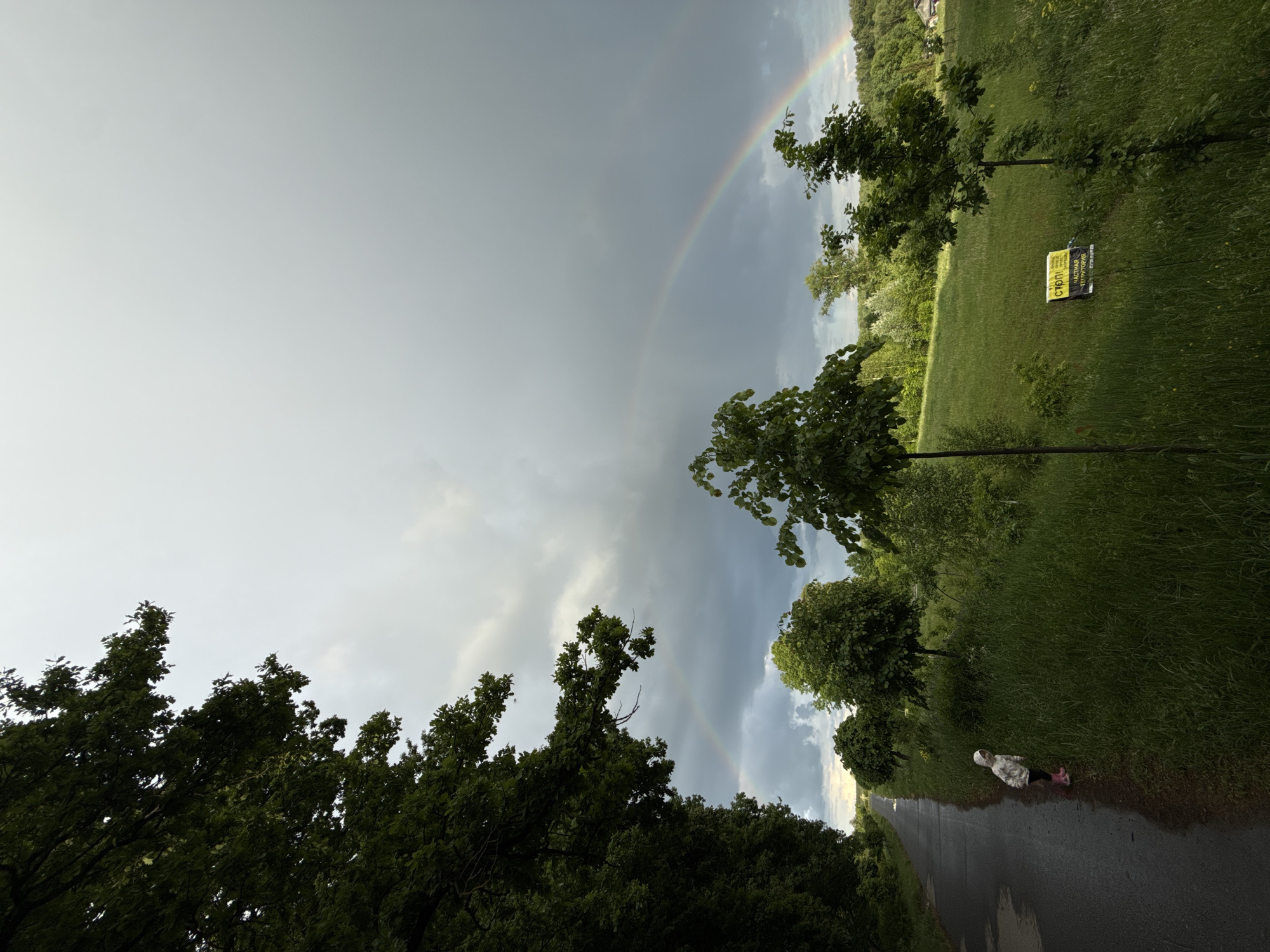 Rainbow appears over Sapronovo, Russia during afternoon storm