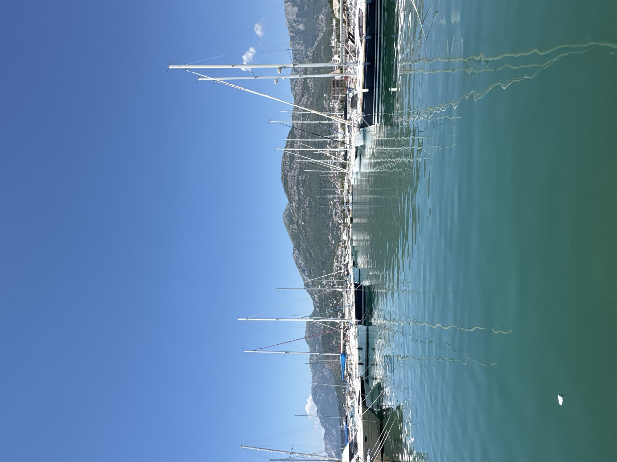 Bar, Montenegro's marina and waterfront promenade on a sunny afternoon.