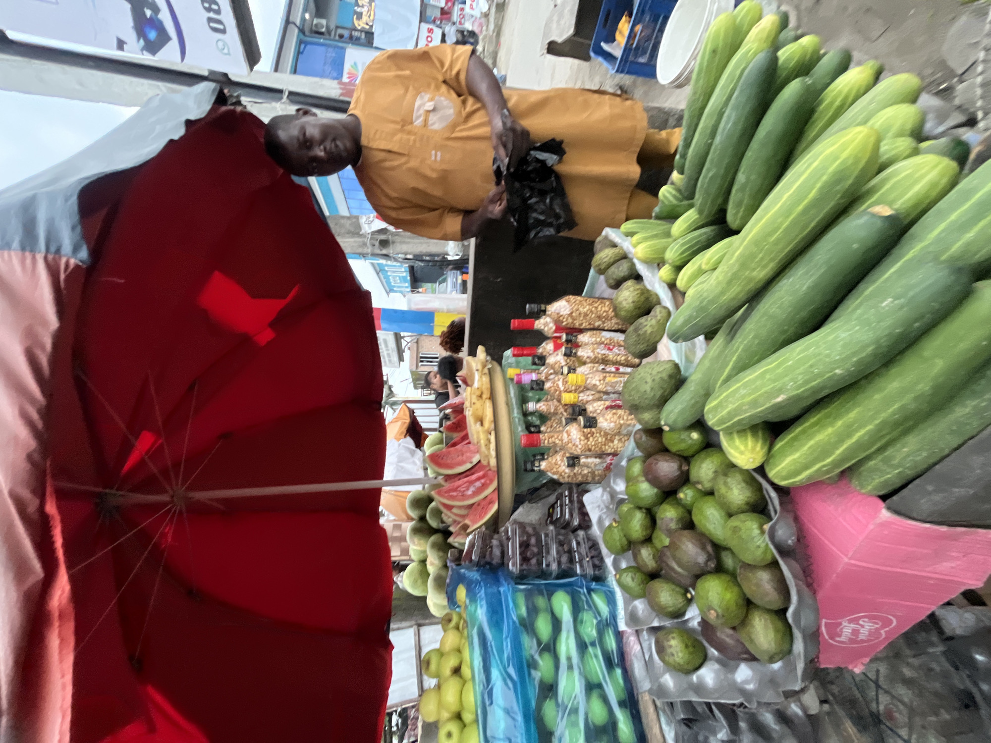 Afternoon street life and market activity in Ado, Nigeria