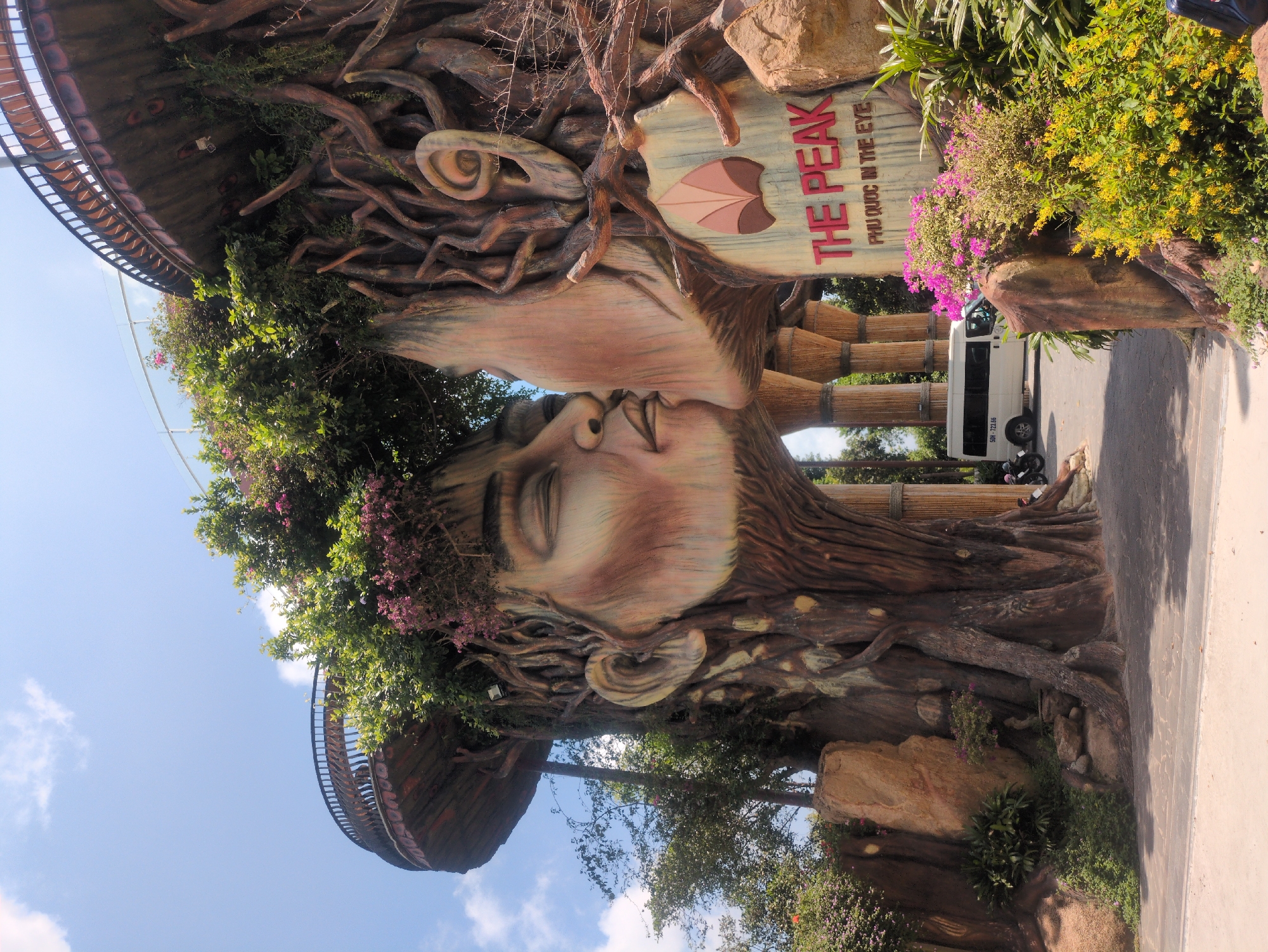 Tourist explores Phú Quốc forest trails and kissing faces sculpture