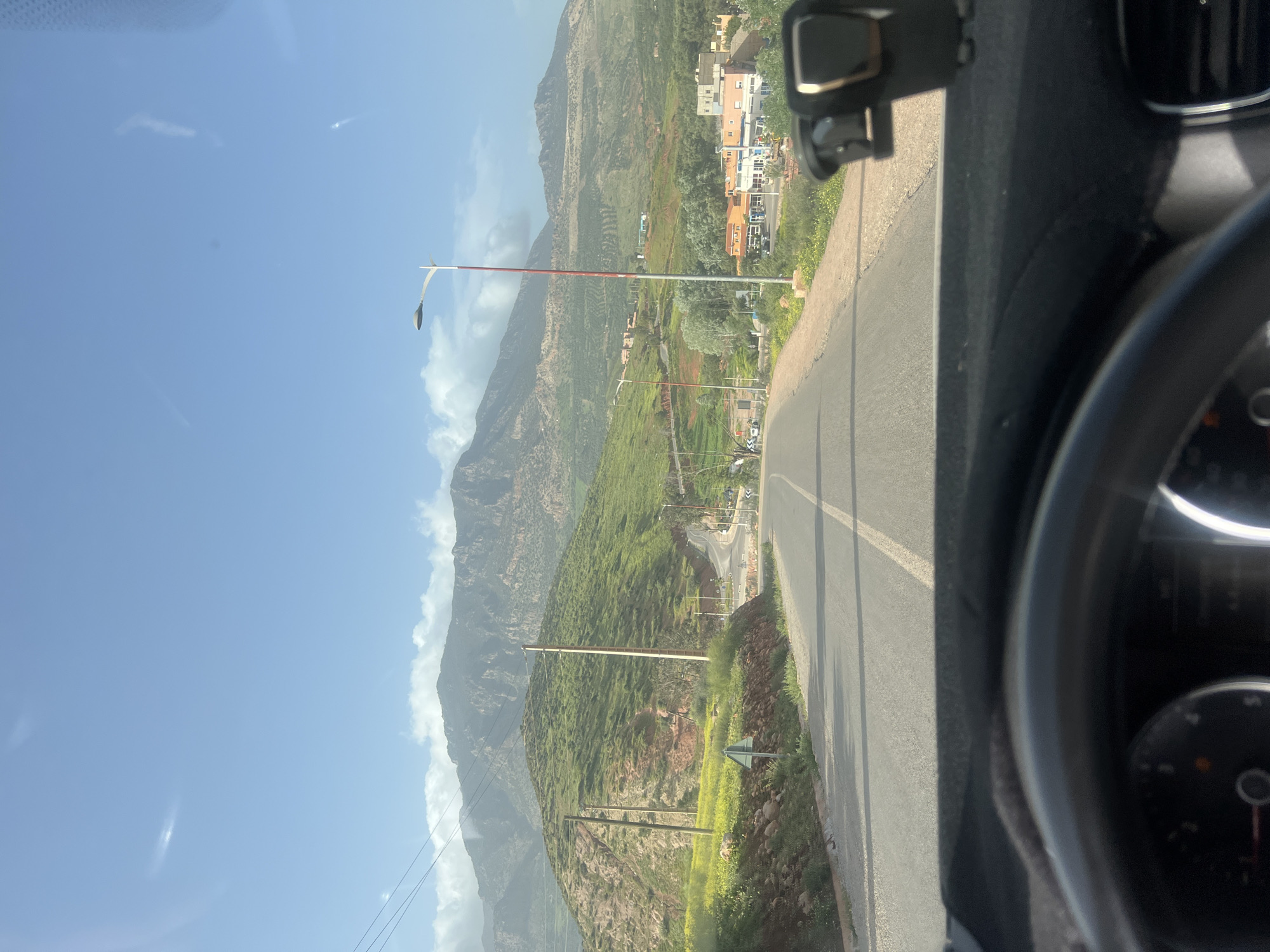 Driver documents scenic mountain journey through Ouaouizert, Morocco