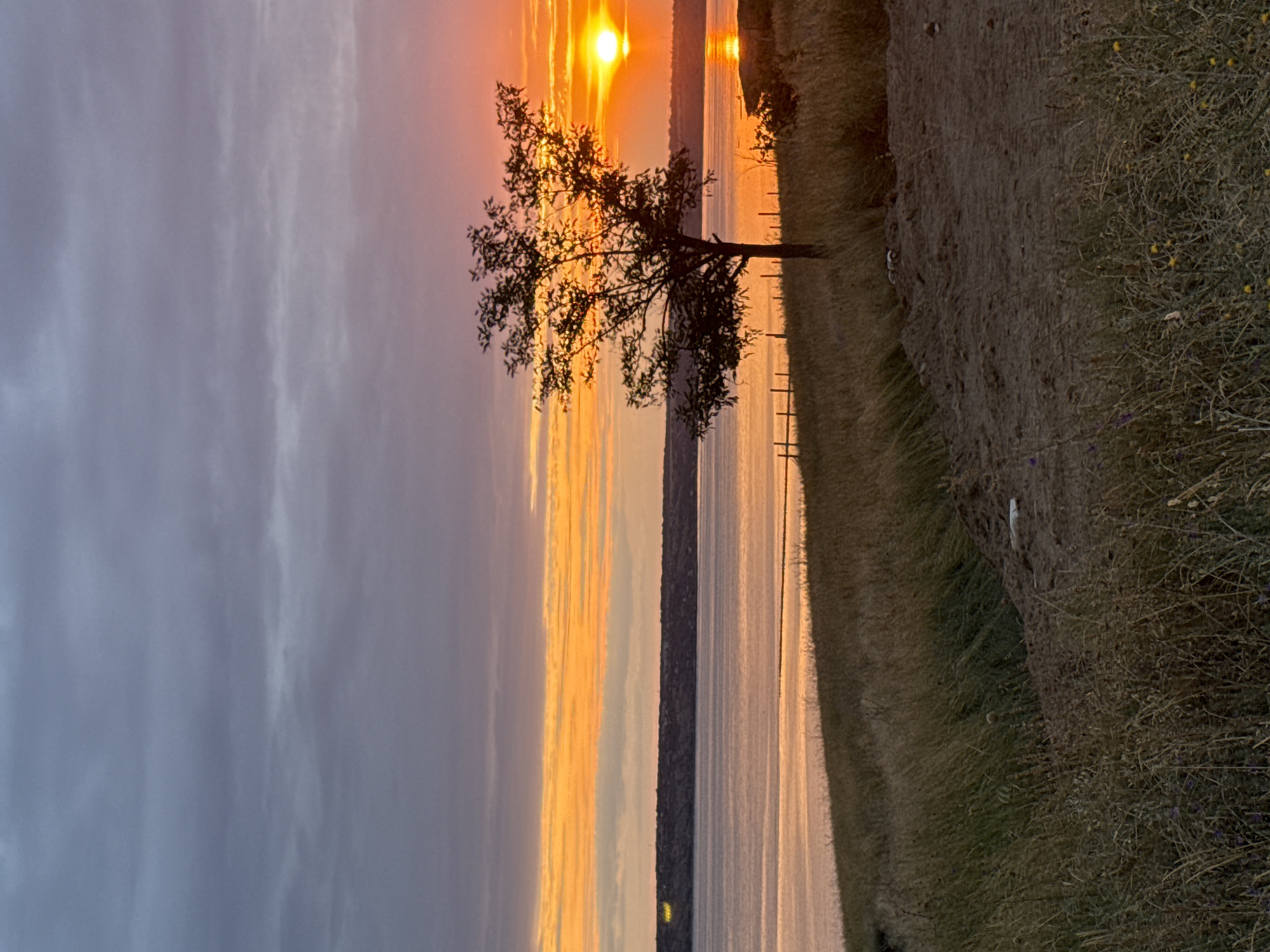 Sunset over the Dnipro River from Protopopivka's hillside