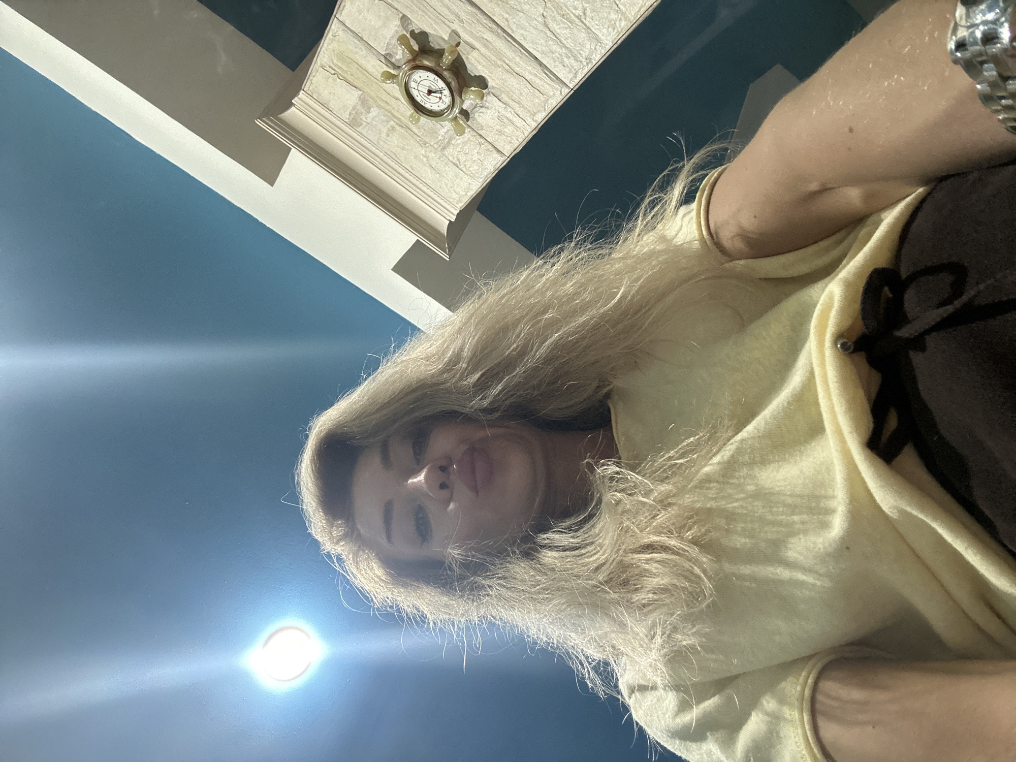 Woman documents afternoon at home with pets in Armavir