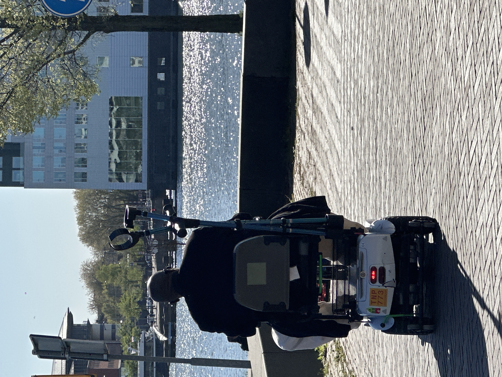 Spring afternoon life documented across Amsterdam neighborhoods