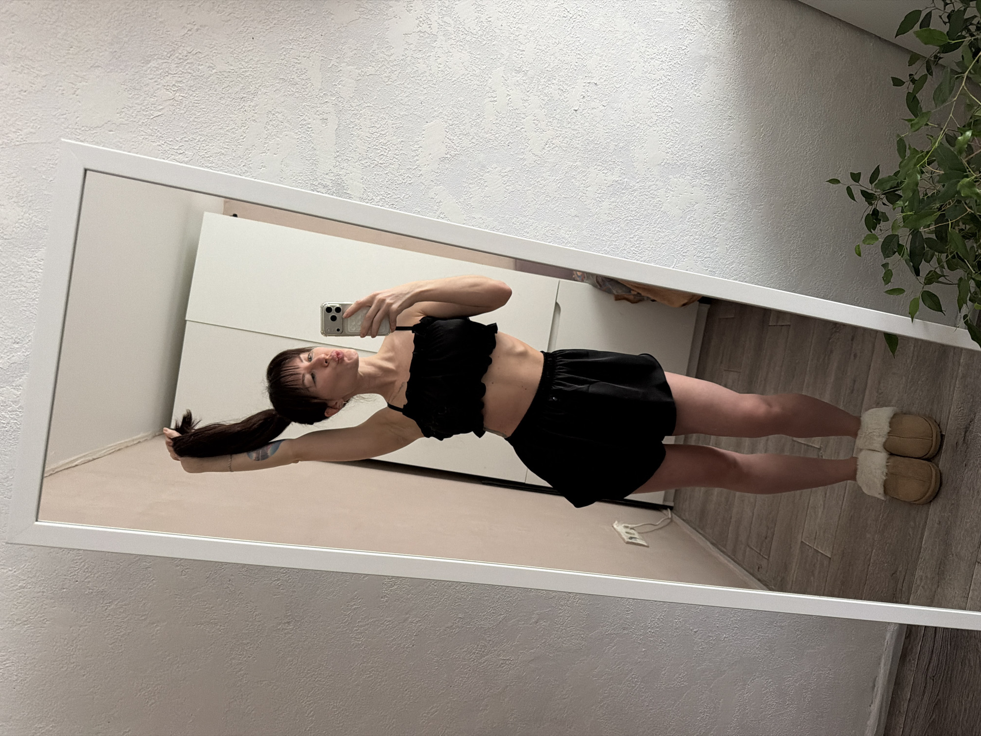 Woman documents morning routine through mirror selfies in Perm