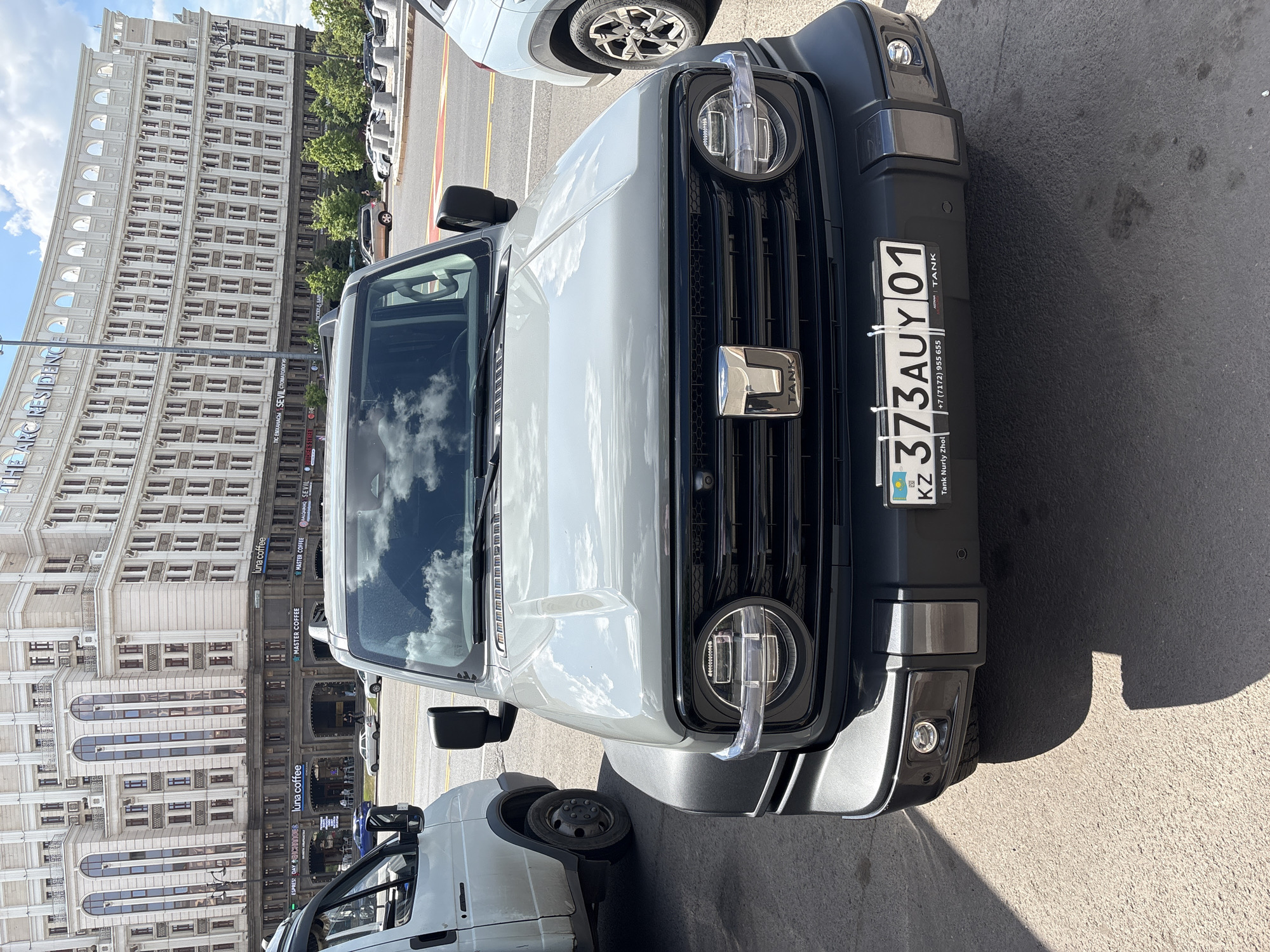 SUVs parked near Mangilik El monument, Astana