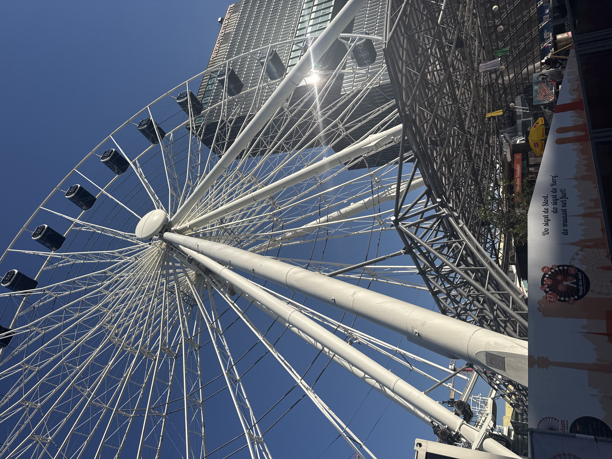Sunny afternoon in Munich — Ferris wheel, café patio, street mural