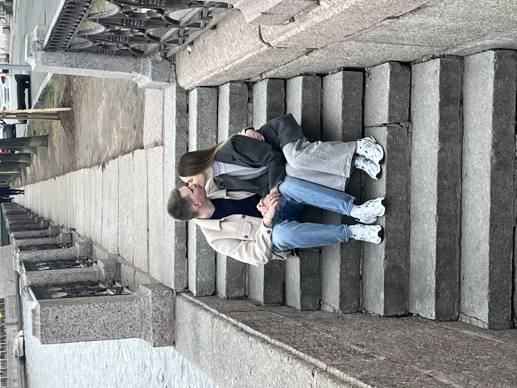 Couple shares romantic moment on Saint Petersburg staircase