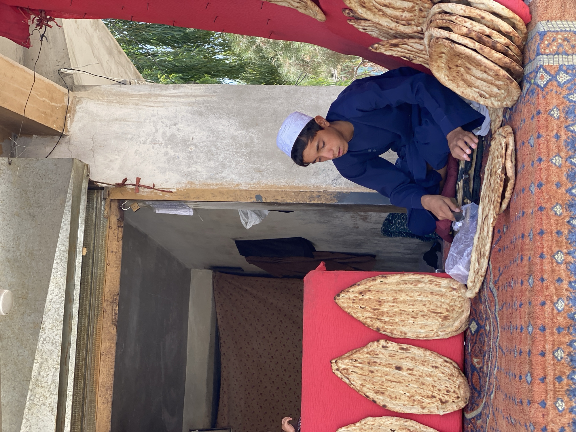 Flatbread stall scene at a Kandahar street market