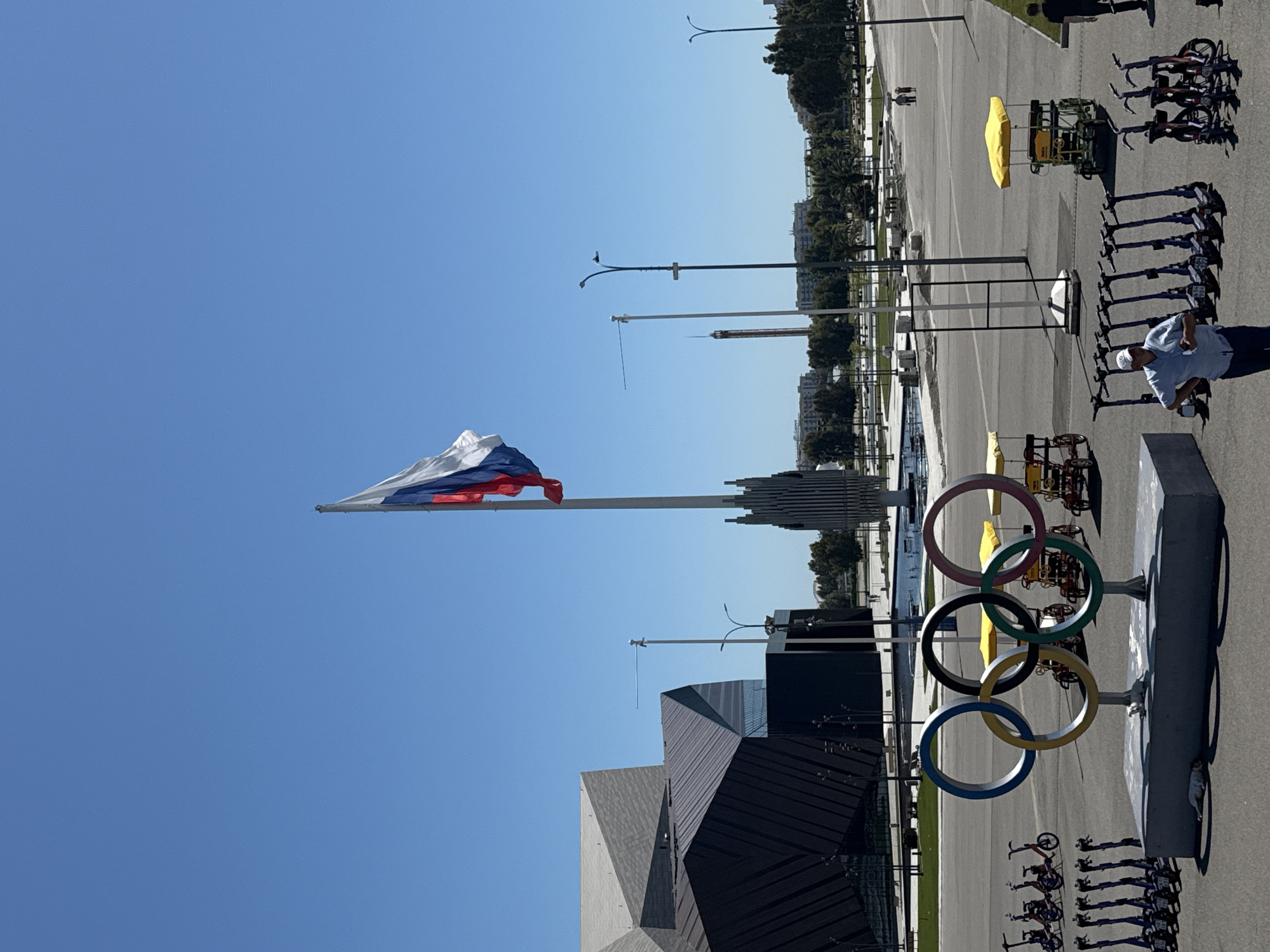 Russian flags wave at Sirius Olympic Park on sunny morning