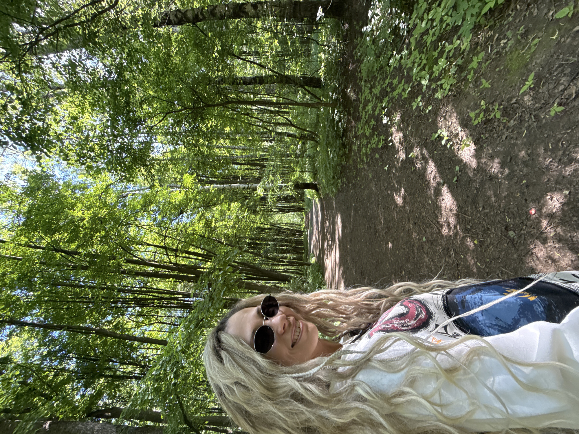 Woman photographed on forest path in Rusanovo, Russia