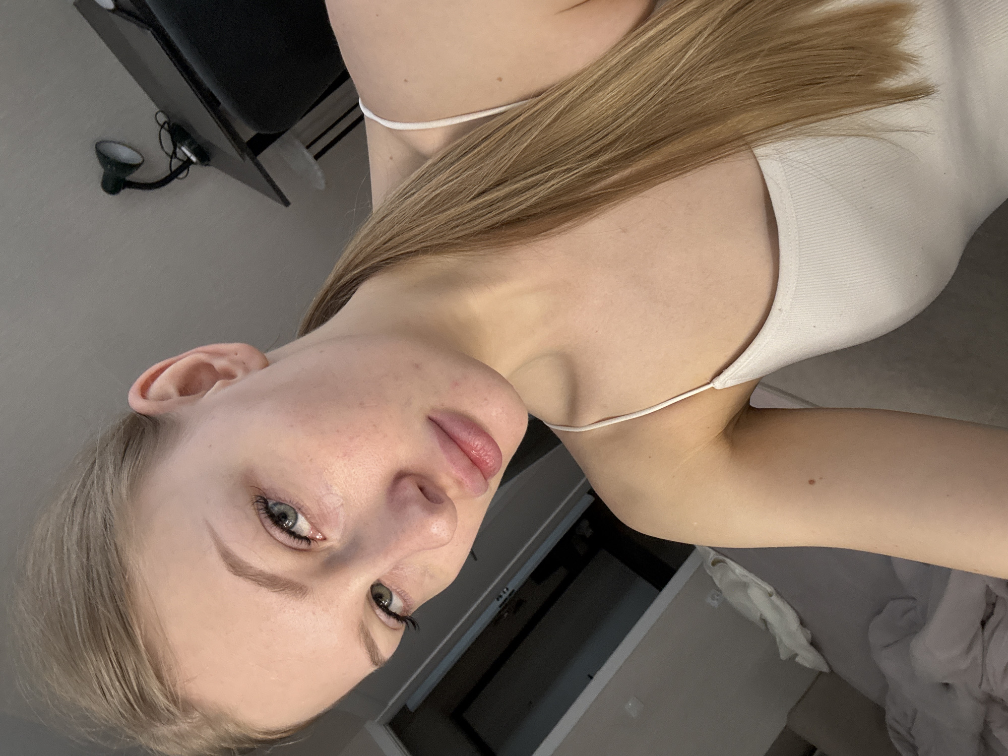 Woman takes selfies in Perm apartment early morning