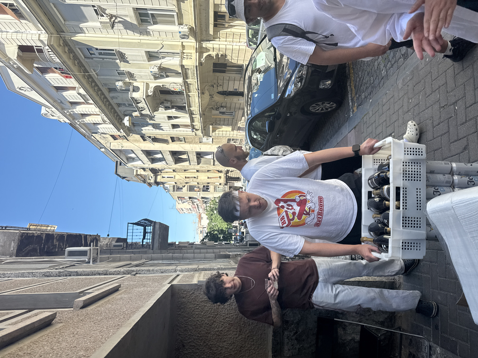 Beverage delivery operation captured on Belgrade street corner