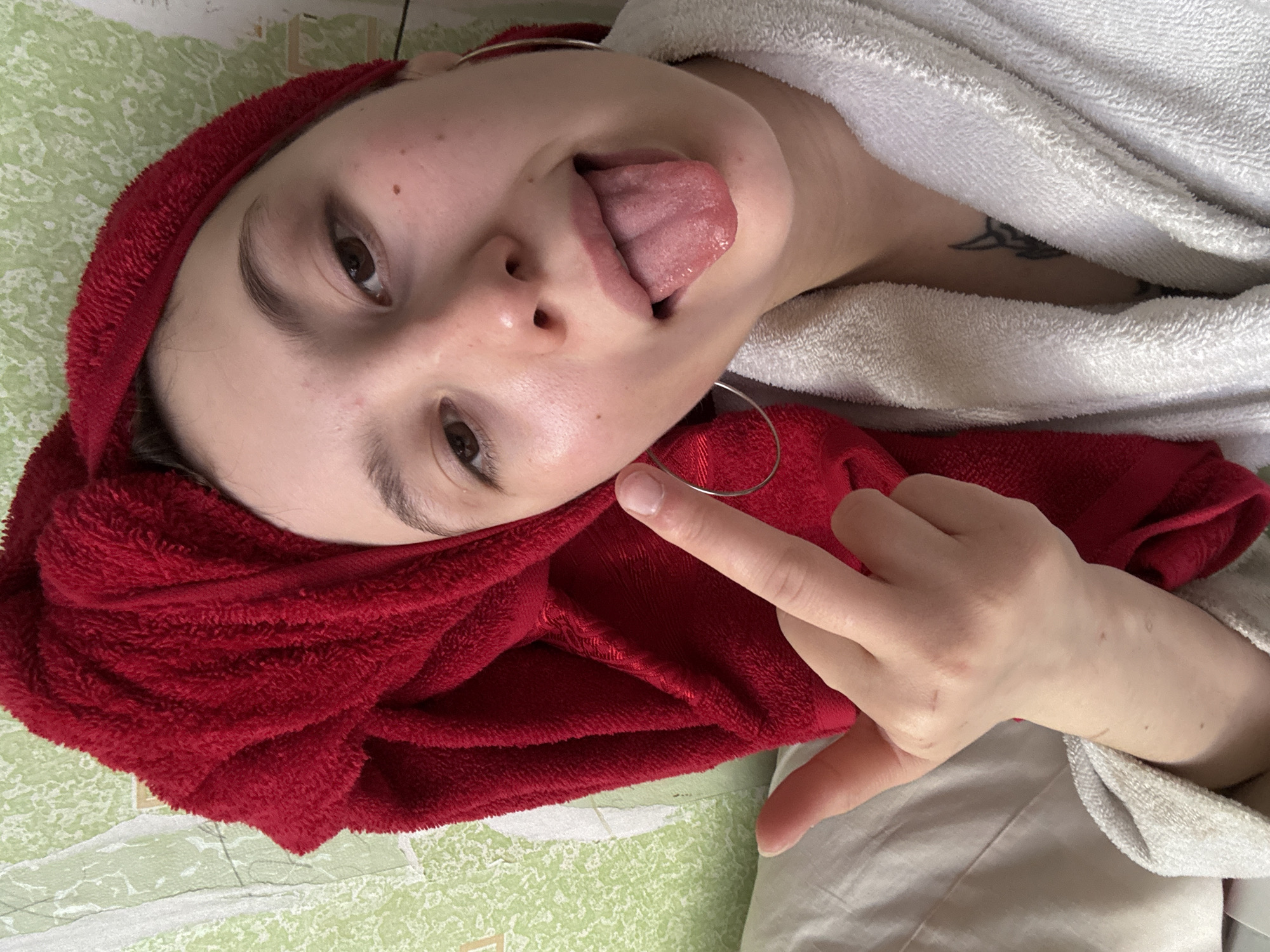 Young woman takes playful selfie portraits in Фоки, Russia