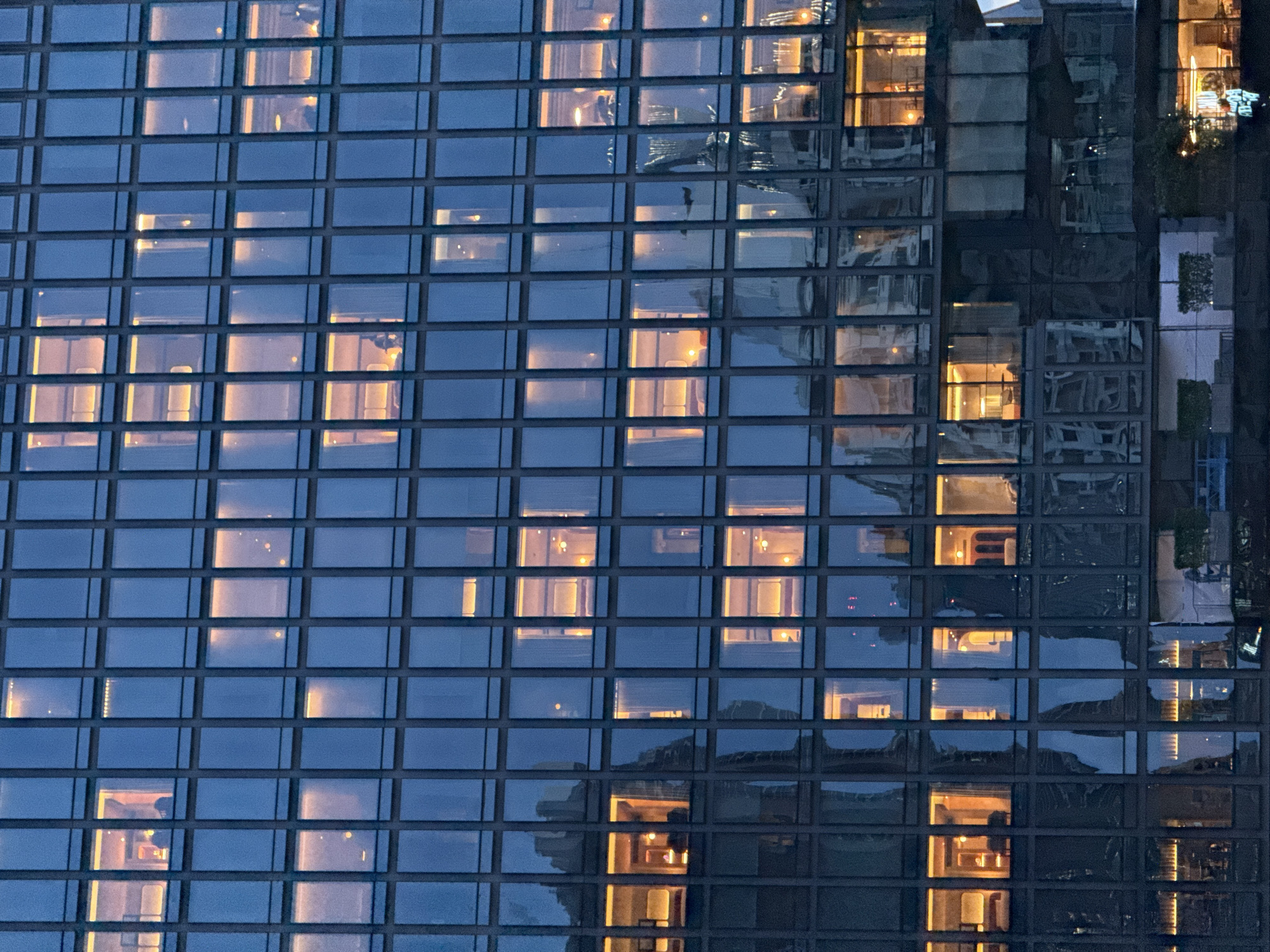 Bangkok skyline at dusk, glass towers and transit hub
