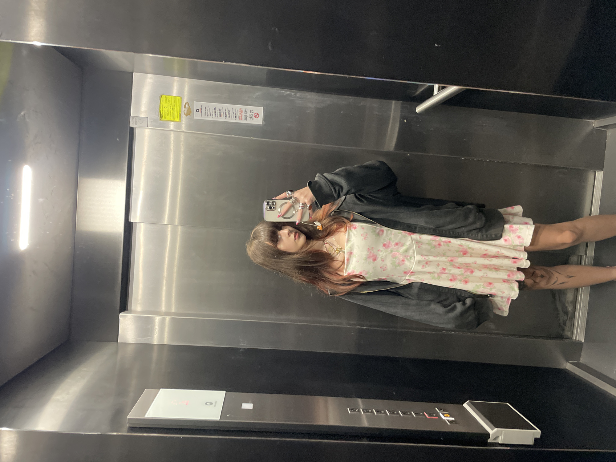 Woman takes selfies in multiple indoor locations in Raanana