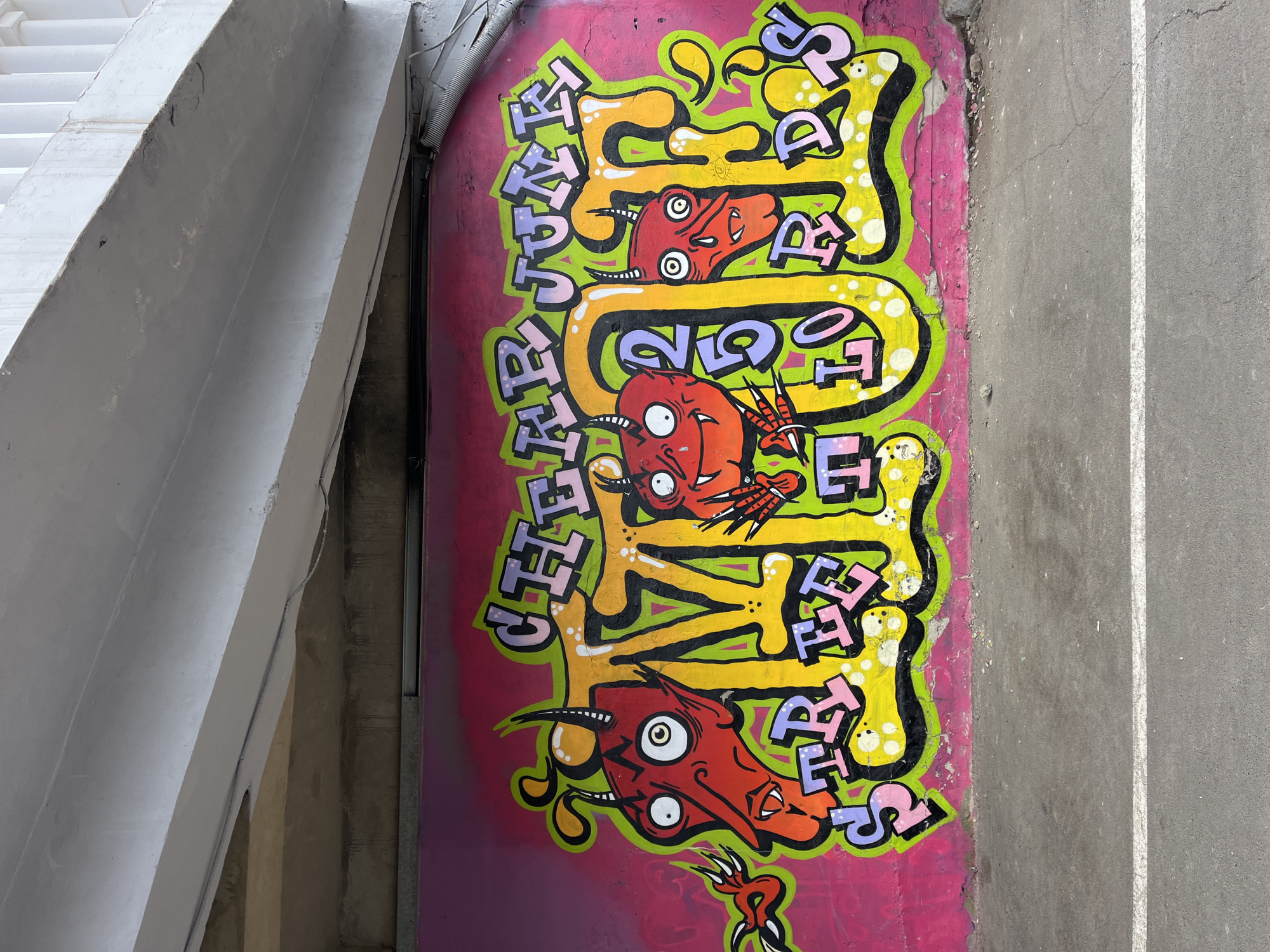 Colorful graffiti murals documented on concrete walls in Krasnoyarsk