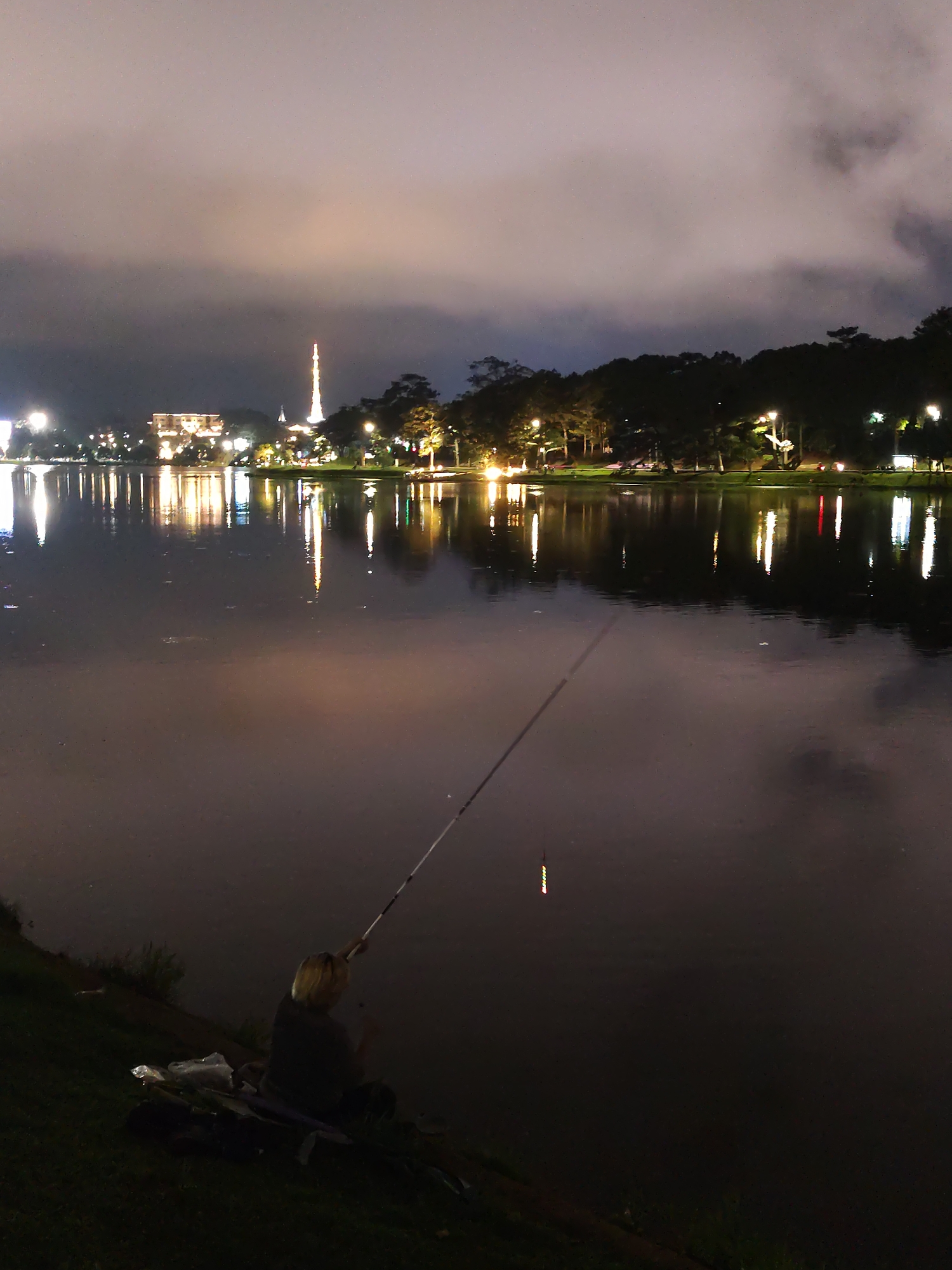Nighttime lakeside scenes captured around Xuan Huong Lake, Da Lat