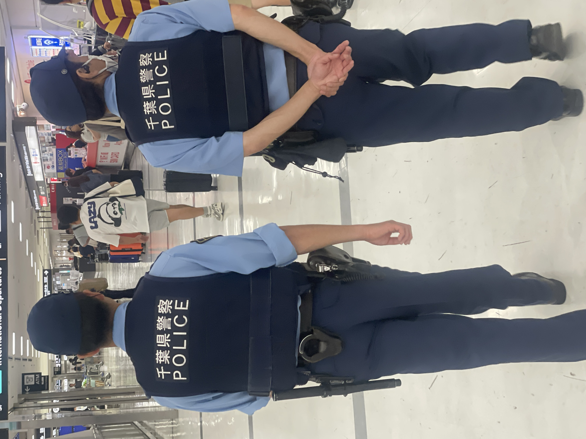 Chiba Prefecture Police on patrol at Narita Airport terminal