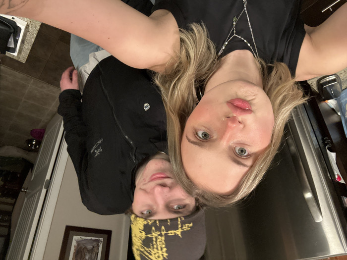 Two people take indoor selfie in Whistler residence